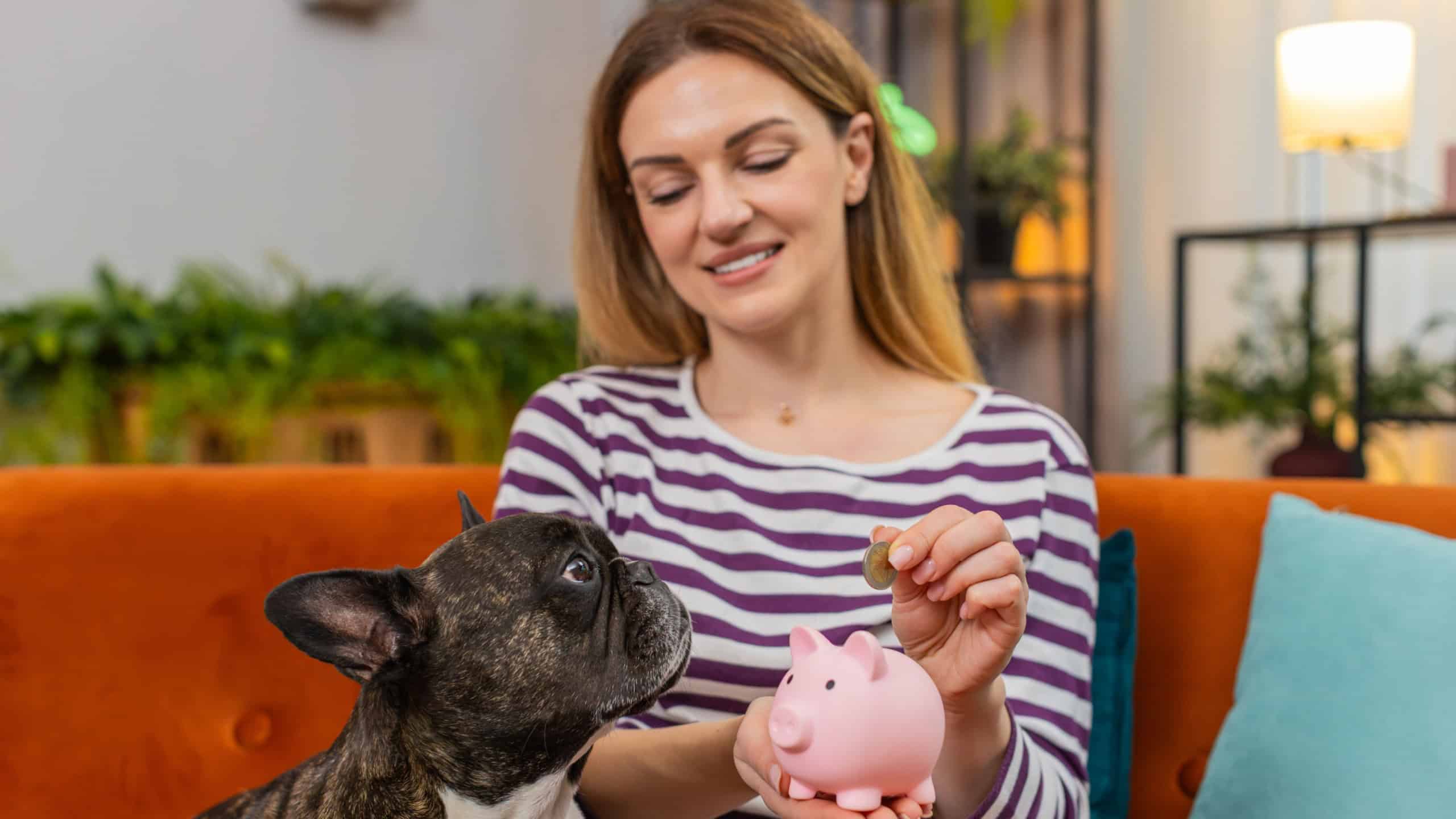 Middle-aged woman with French bulldog at home drops coins into piggy bank calm voice and simple tips. Girl with dog on sofa explains savings plan smiles friendly joke clear budget goal smart habit joy