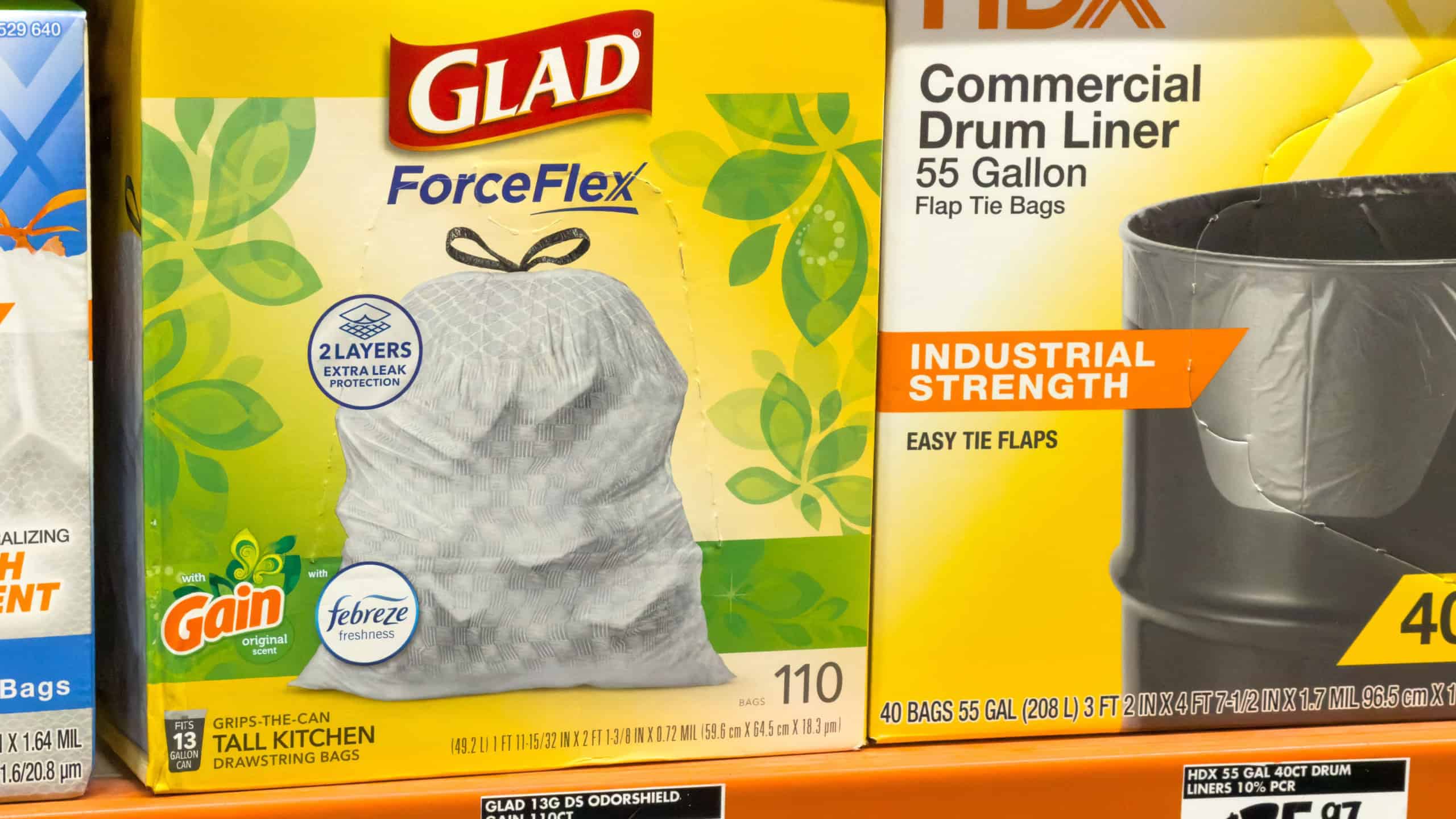 Los Angeles, CA - November 24, 2025: Glad Force Flex and HDX Trash Bags on Store Shelf.