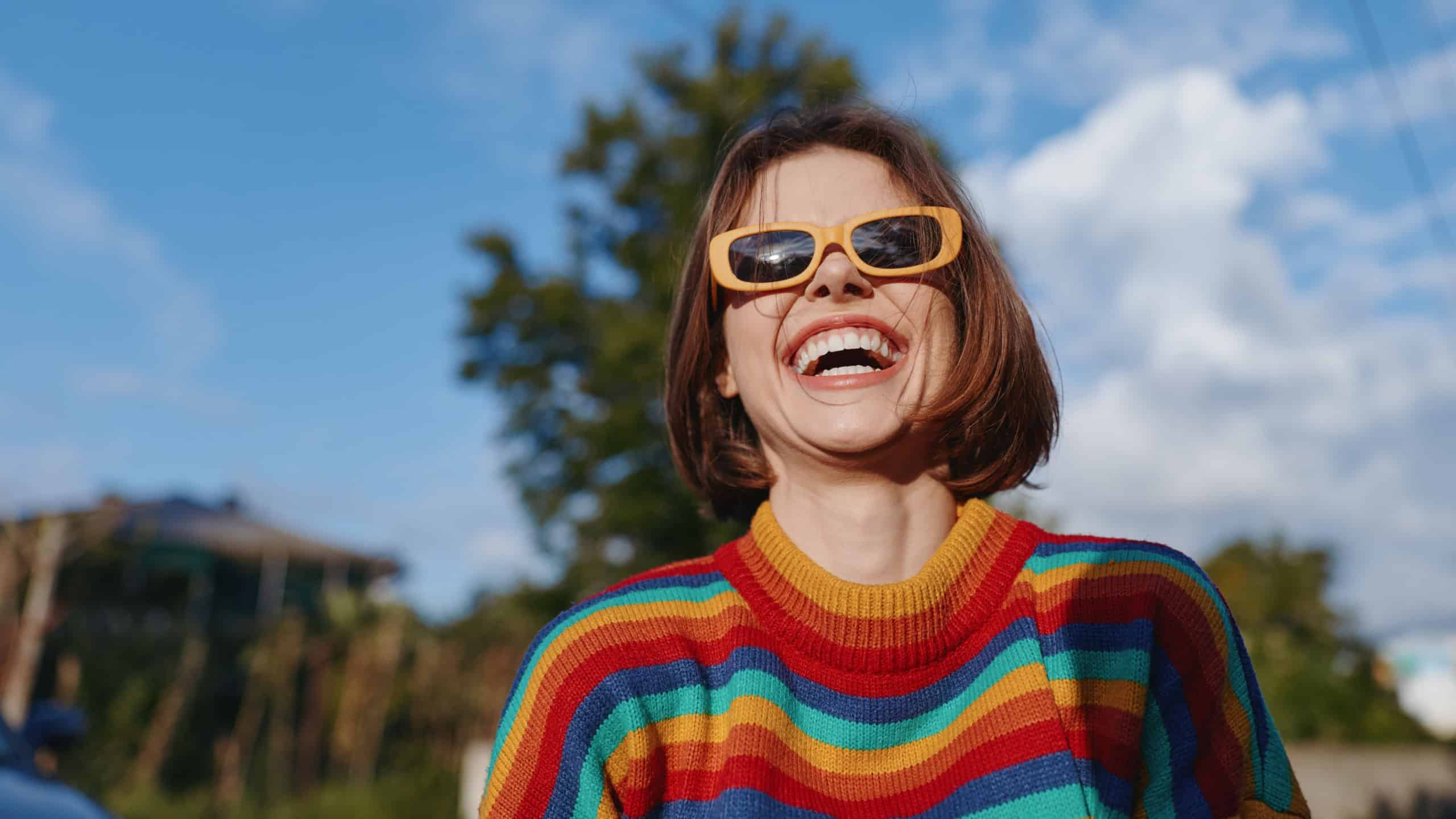 Father and son having fun playing soccer or football in their home's backyard or green grass field. Man and boy, Adult with kid, Sports activity.