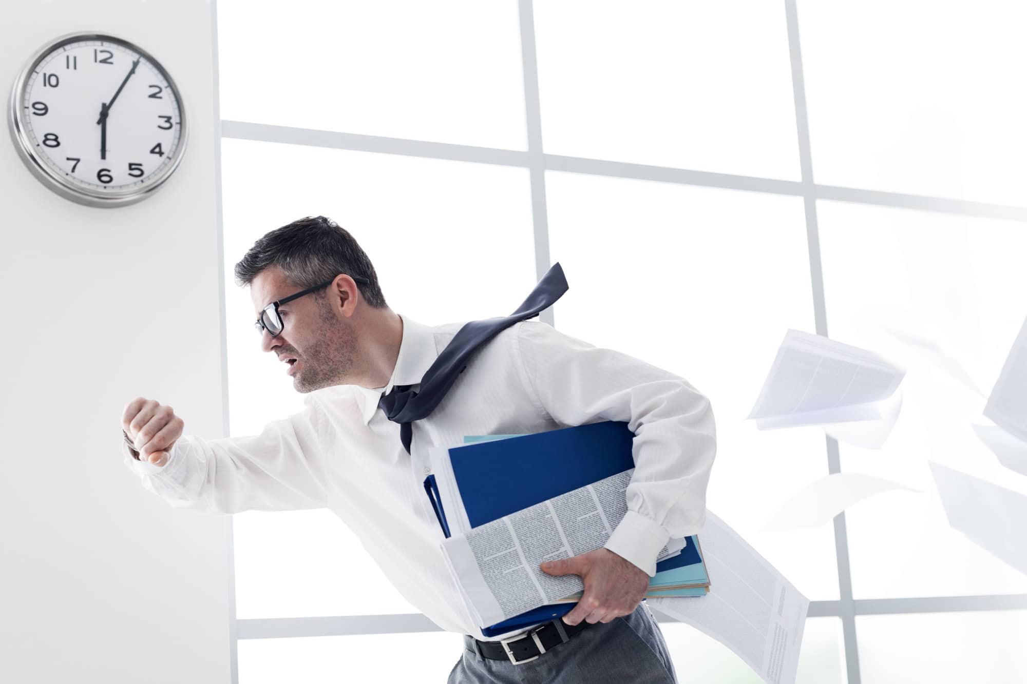 Stressed anxious businessman in a hurry checking time and running, he is late for his business appointment
