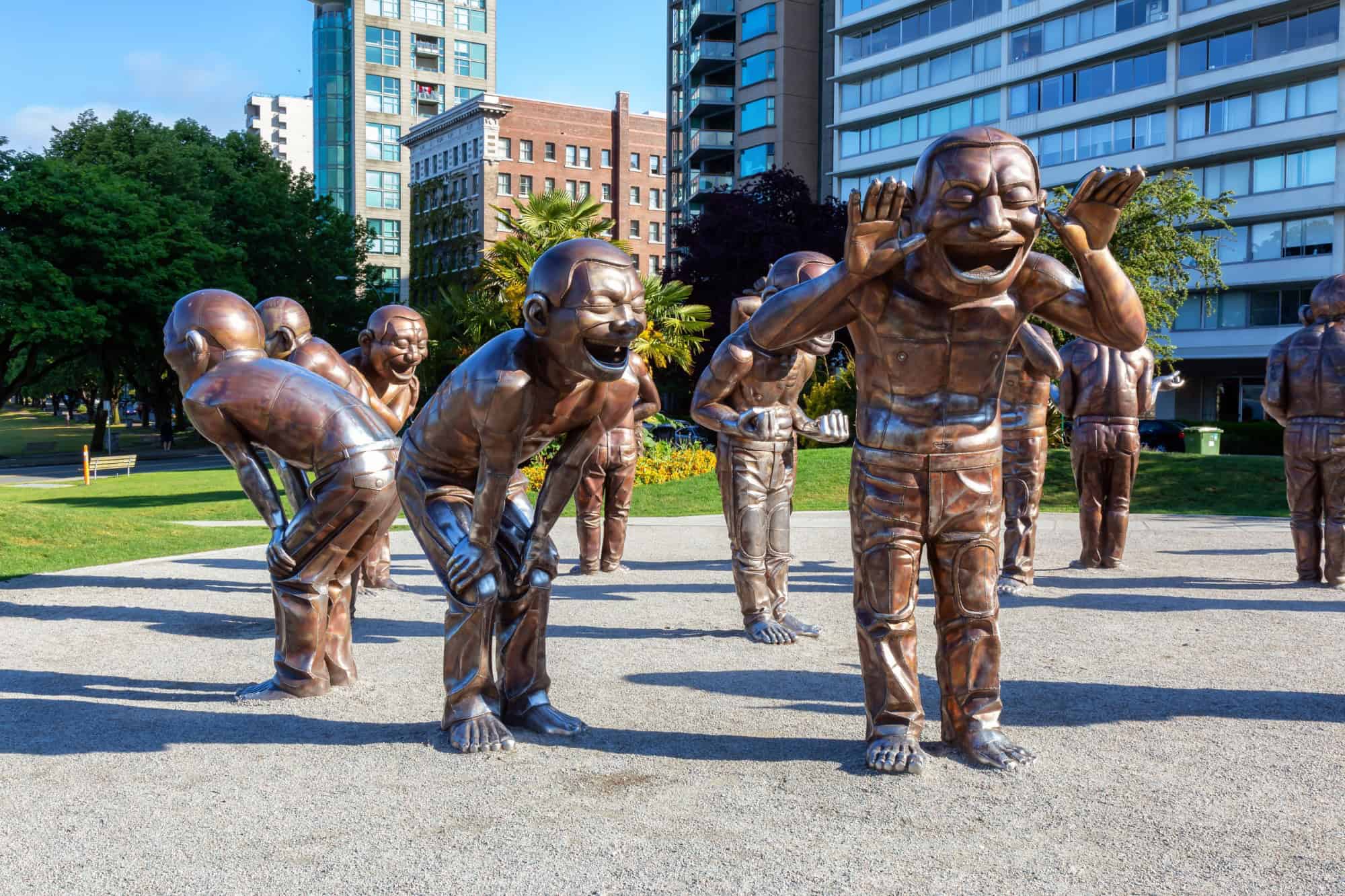 A-maze-ing Laughter Statues in the city during a sunny morning