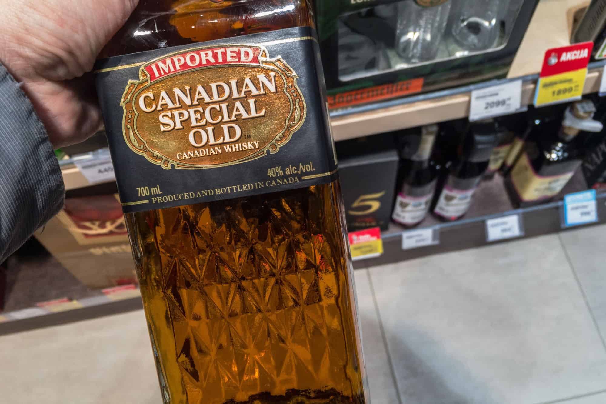 Canadian Special old Whisky logo on some bottles for sale. Canadian Special old is a brand of blended Whisky from Canada.