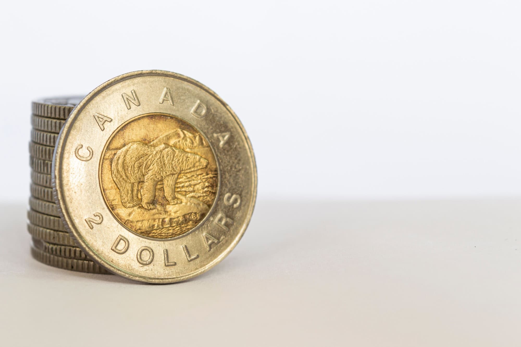 Canadian two-dollars coin isolated on white background closeup