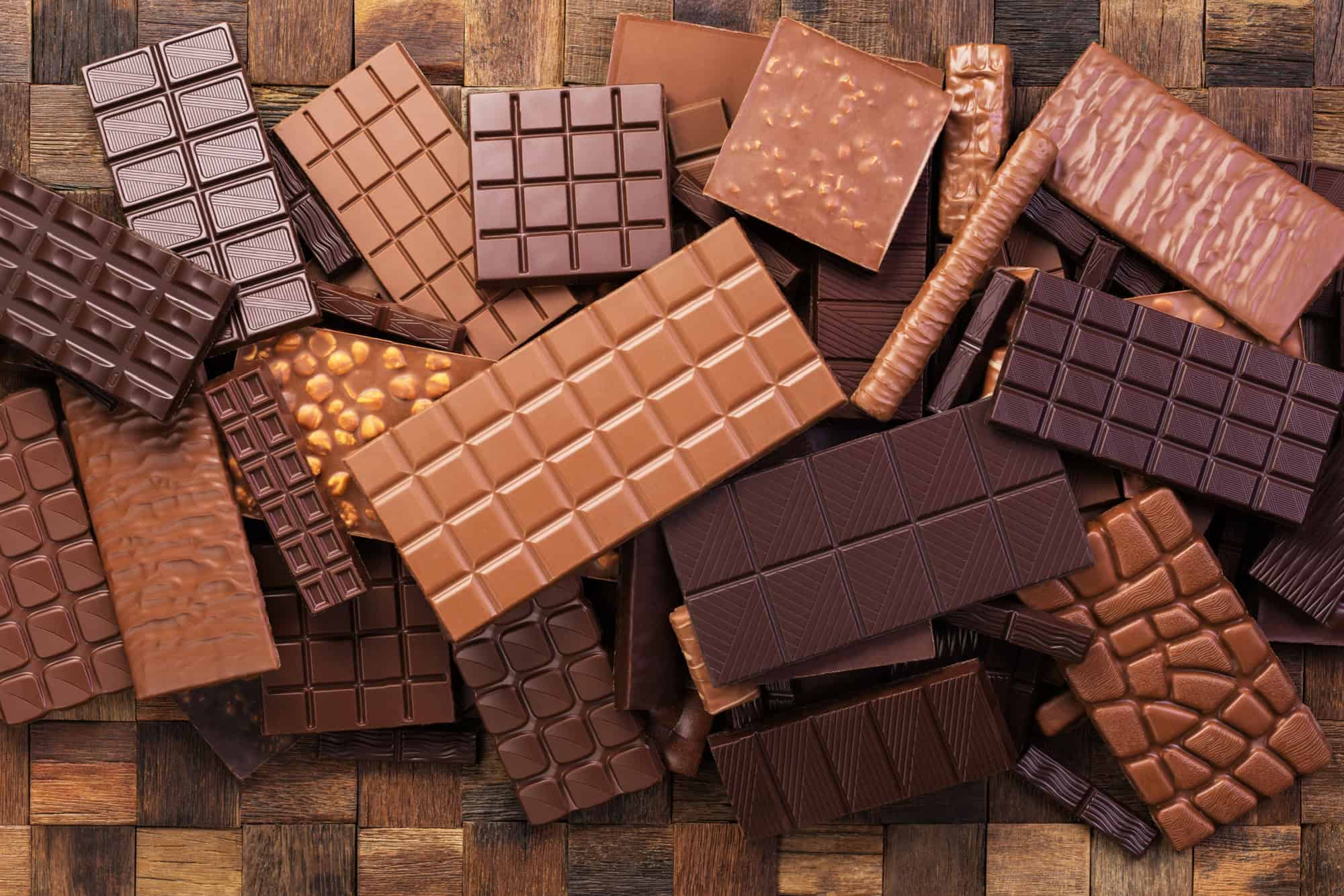 Collection chocolate bars, top view. tasty dessert of cocoa products