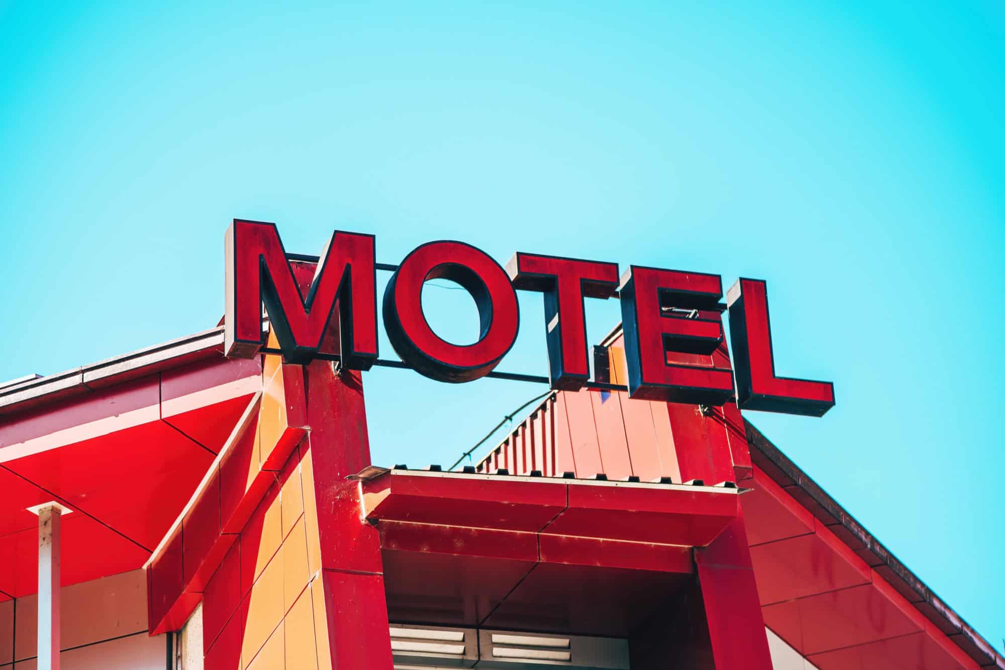 Motel sign on top of the building, selective focus