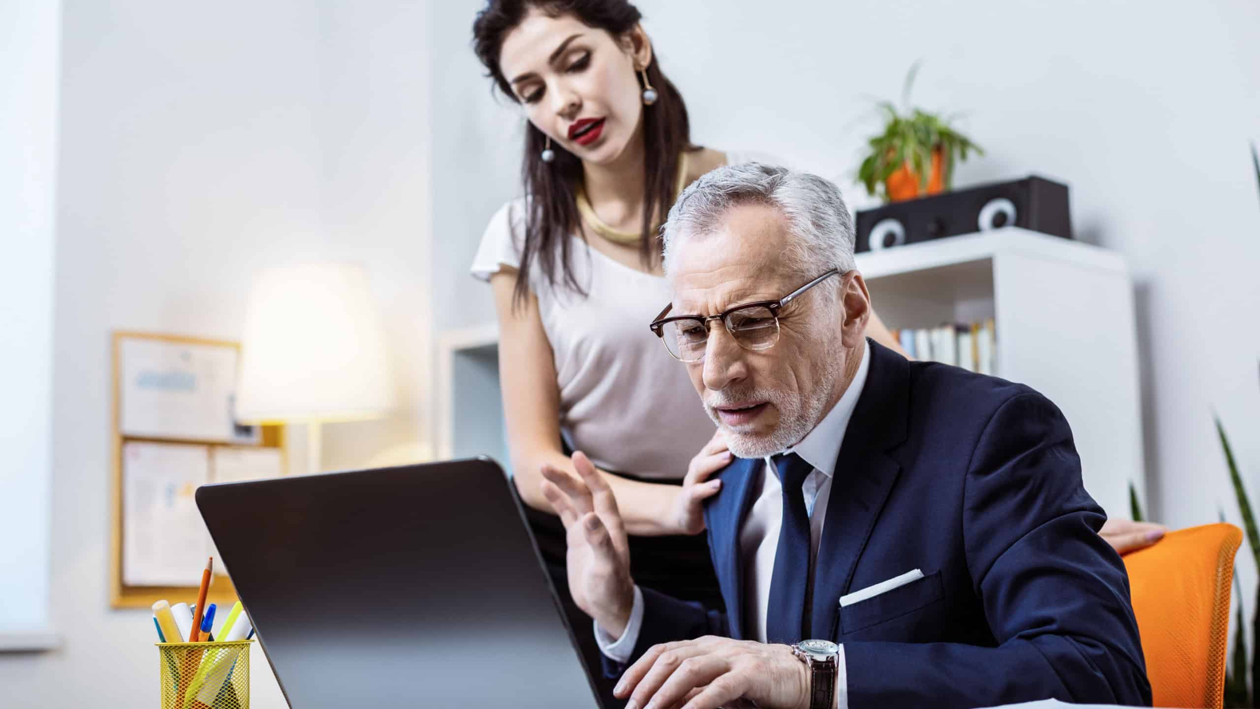 Expressive dark-haired woman. Active attractive woman interrupting her busy senior boss while he being irritated