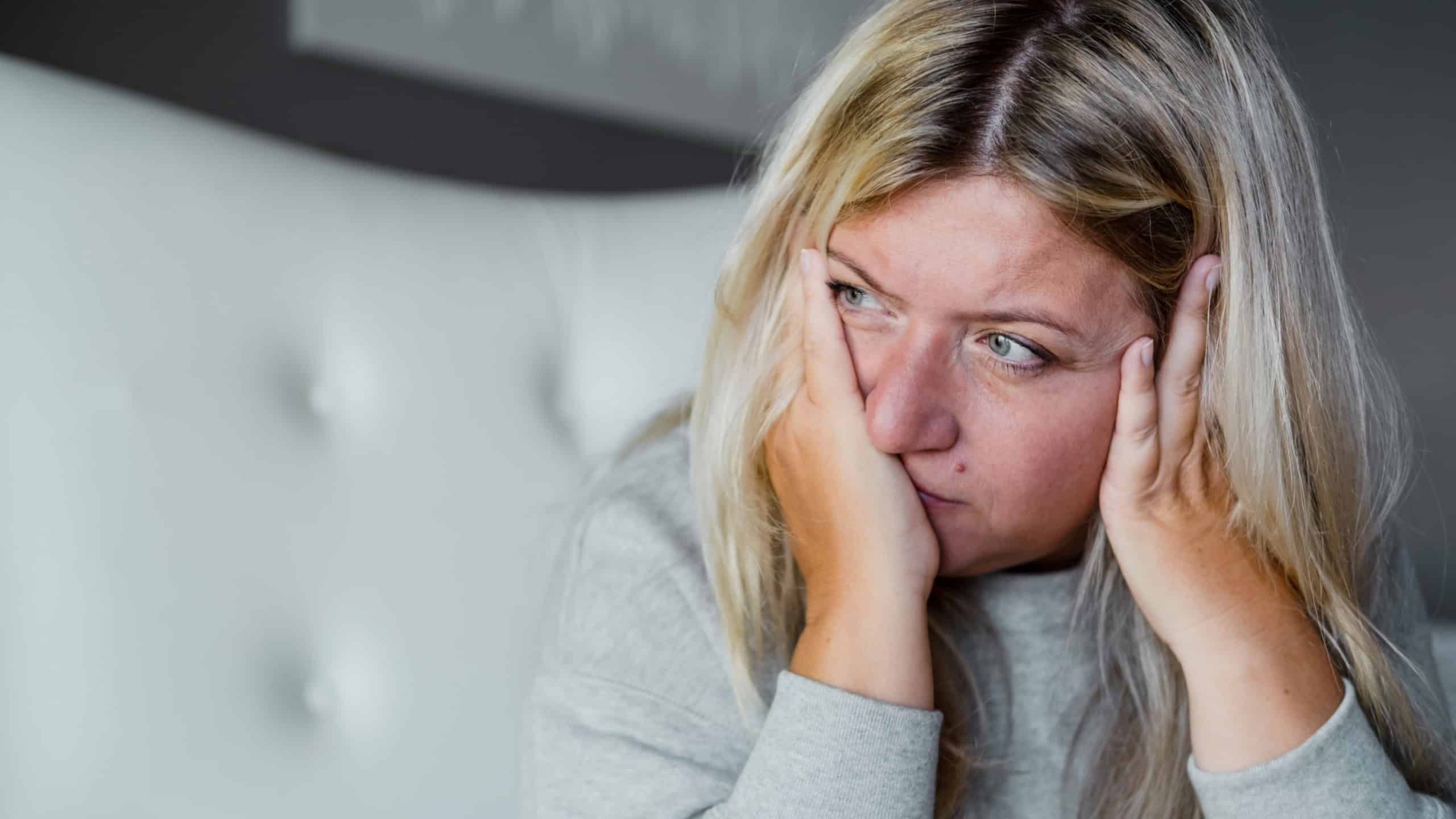 Unhappy woman thinking about health problems. Mental health overweight problems.