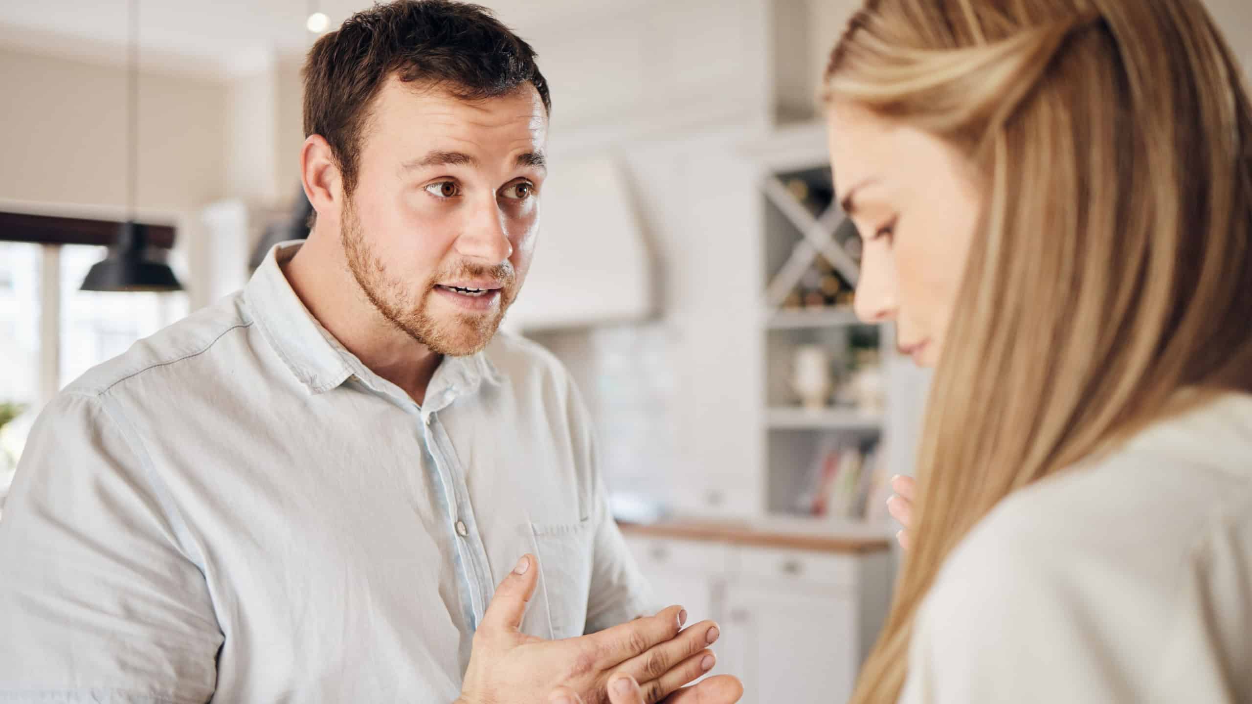 Argument, fight and couple talking for divorce, conflict and disagreement for marriage crisis. Home, argue and frustrated man and woman in discussion for breakup, toxic relationship and affair