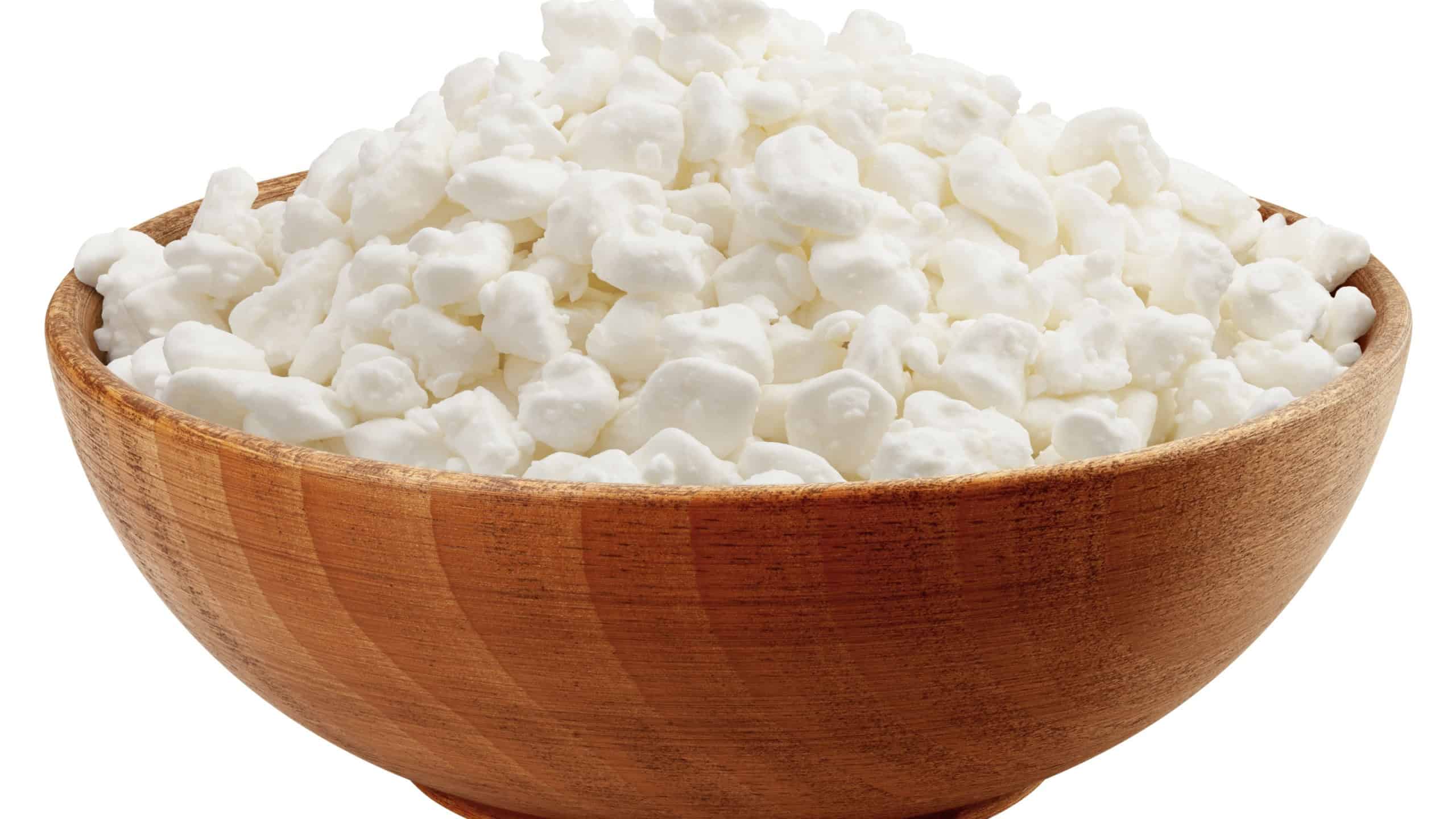 Cottage Cheese, Curd in wooden bowl