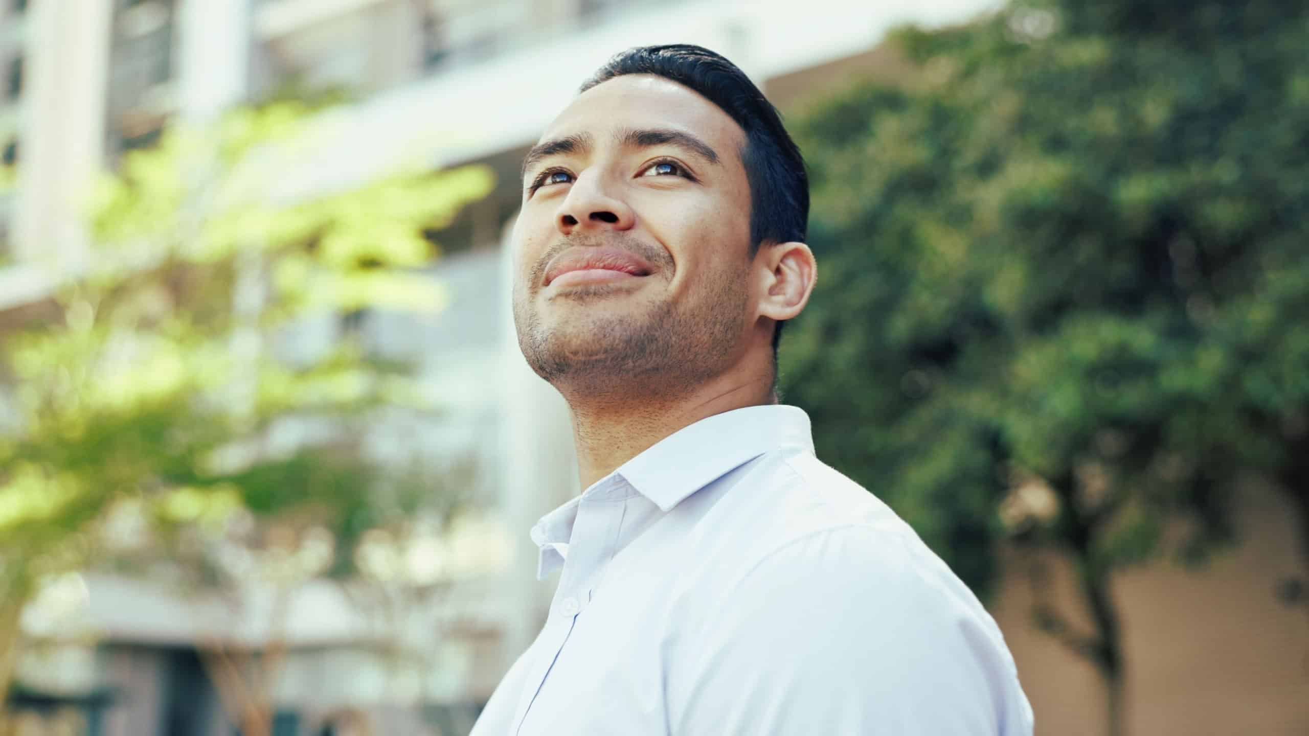 Thinking, smile and travel with business man in city for reflection, future and morning commute. Pride, confidence and professional with male person in downtown for corporate, vision and memory