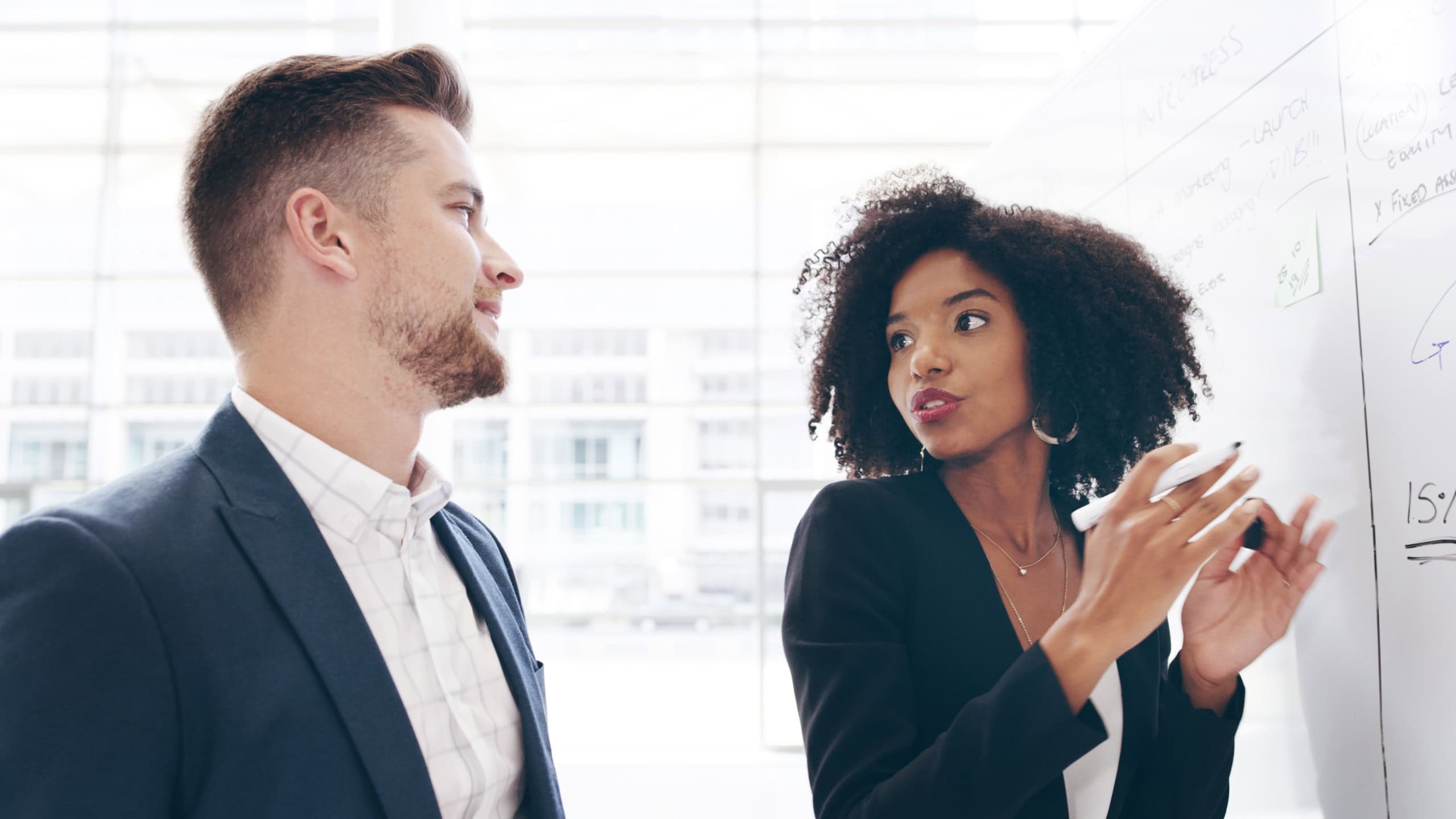 Whiteboard, planning or business people in discussion with manager, task or project management. Training, ideas or leader with teamwork for brainstorming for agenda, development or company resources