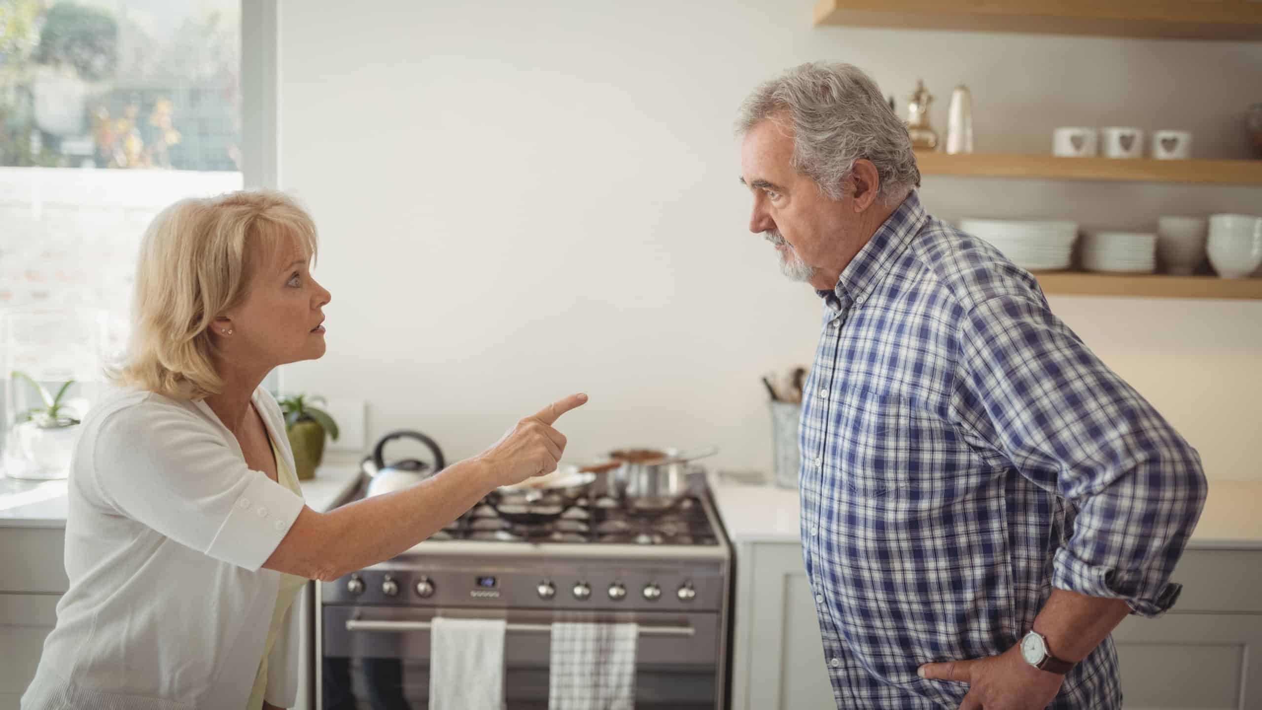 Mature couple having argument, unhappy, shouting
