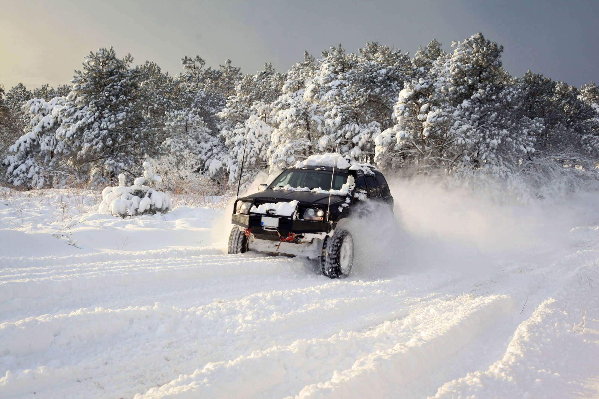 One SUV 4x4 cars go on snowy road, winter season, very cold, Istanbul Turkey, January 1, 2016