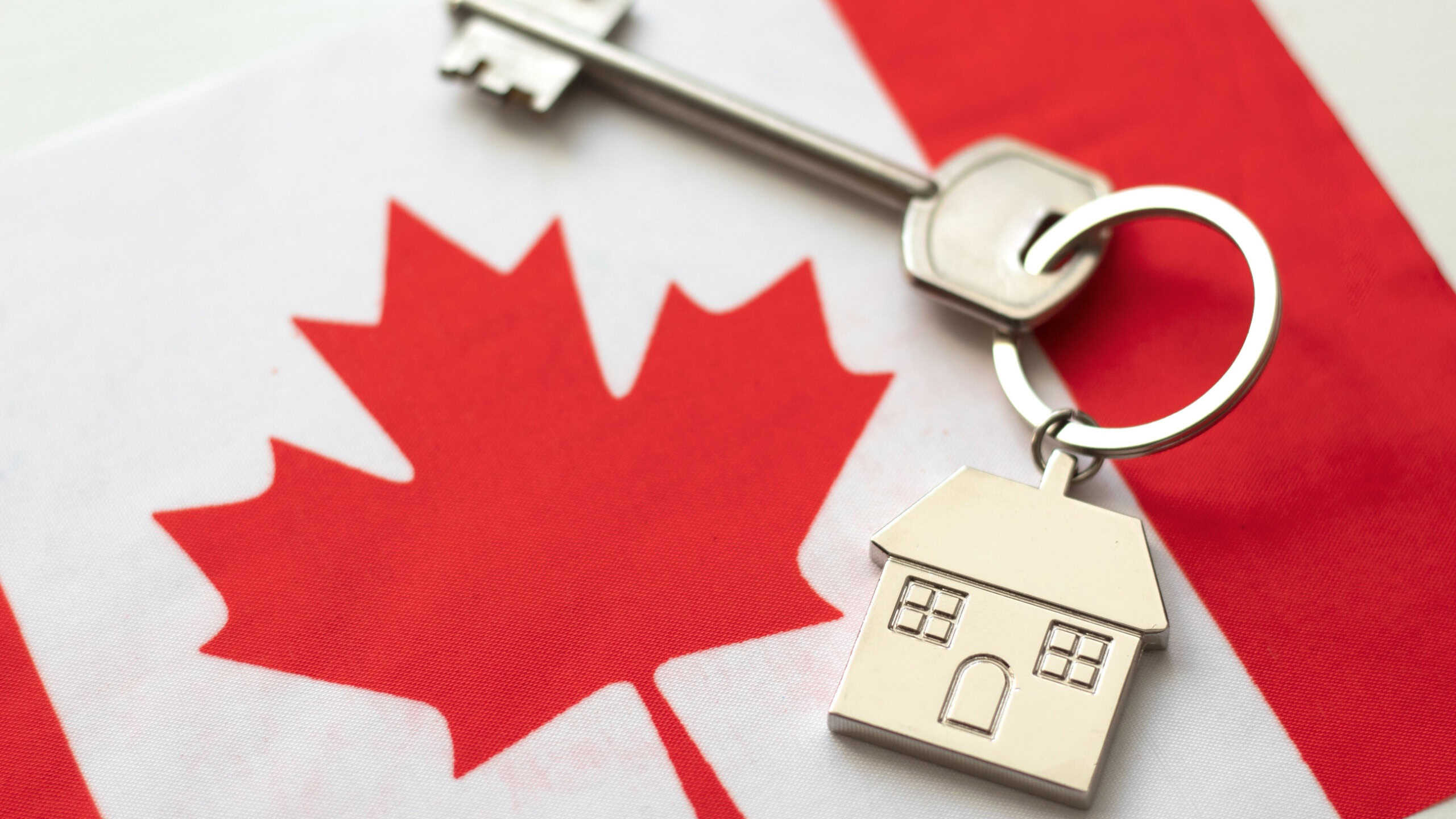 House with the flag of Canada. Immigration to Canada. Buying real estate. Houses for rent in Ottawa. Property price. Acquisition of real estate in another state.