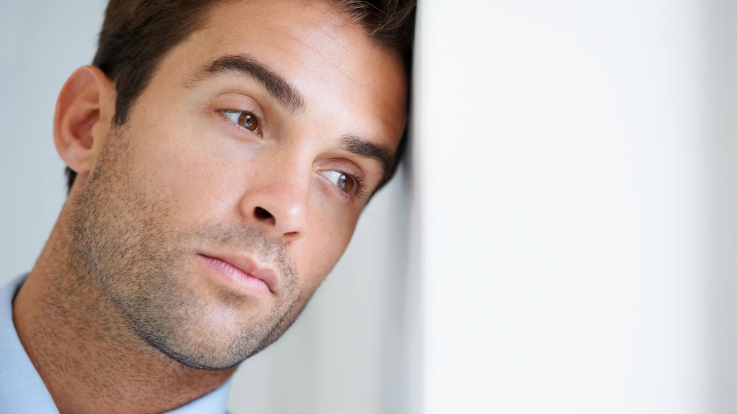 Stress, thinking and business with man, wall and idea with problem solving, entrepreneur or consultant. Anxiety, person or worker with startup, thoughts or corporate with depression, sad or planning