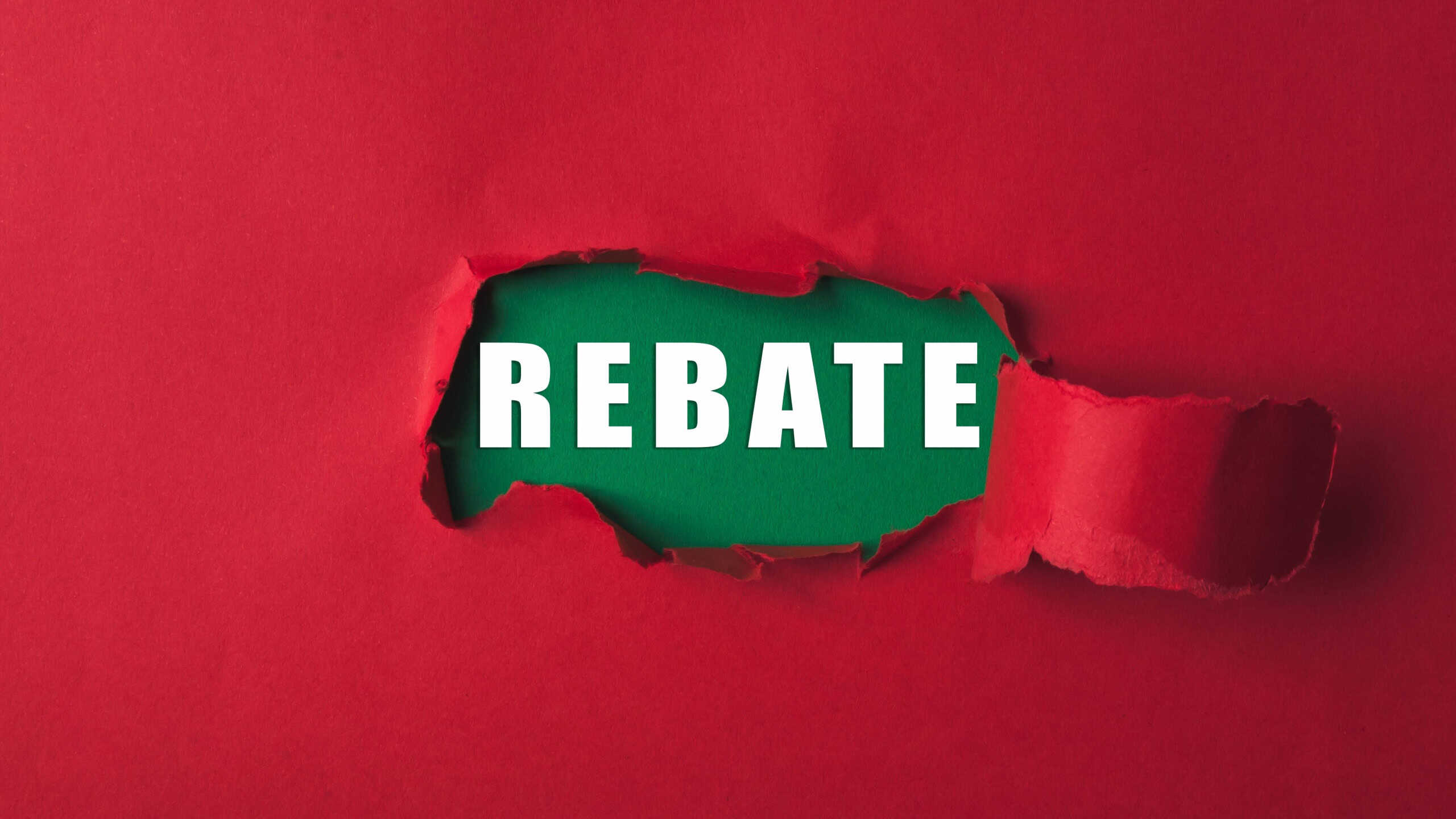 A red background with a green border and the word REBATE written in white. The image has a sense of mystery and intrigue