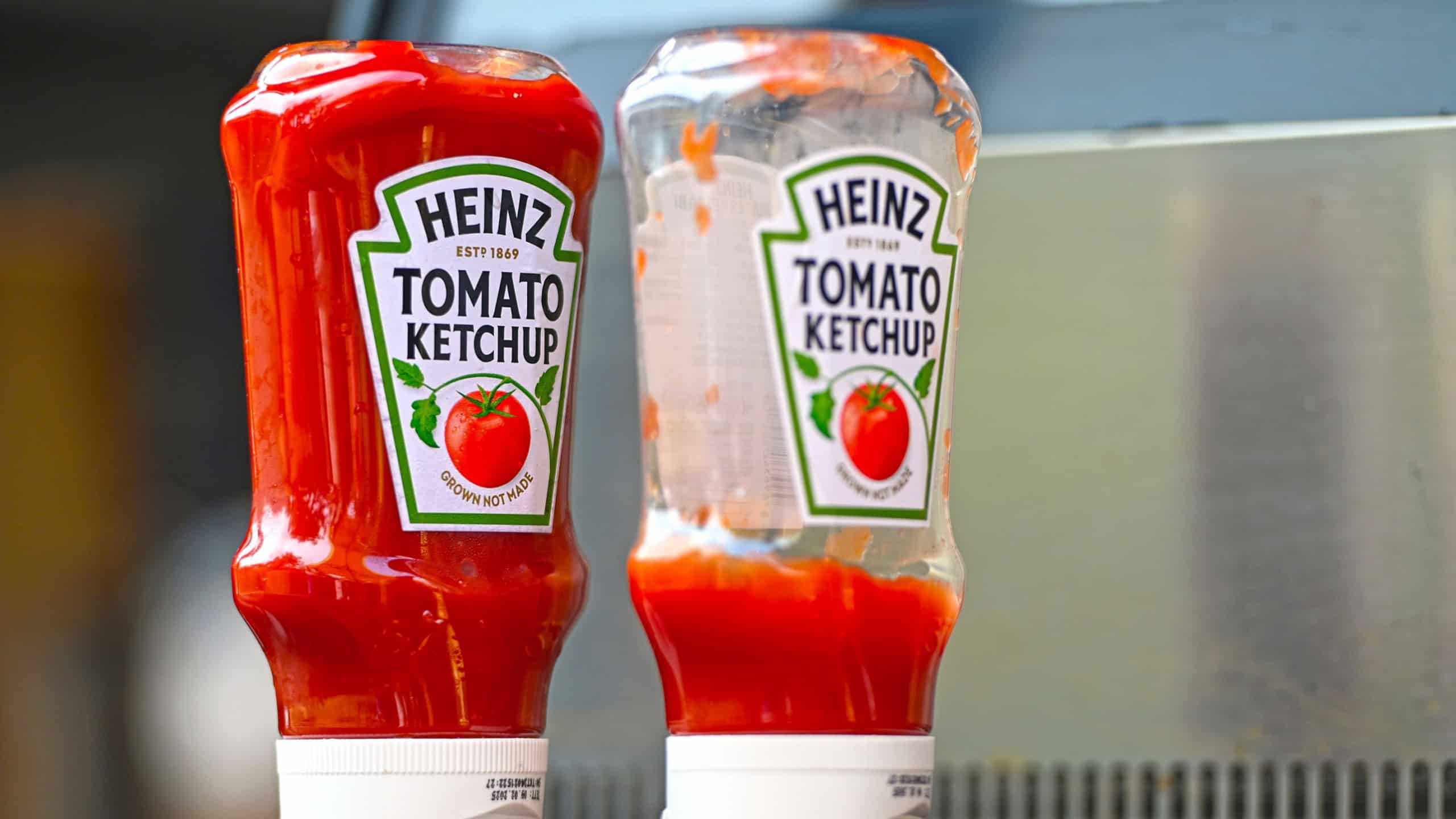 Close-up of two used bottles Heinz tomato ketchup