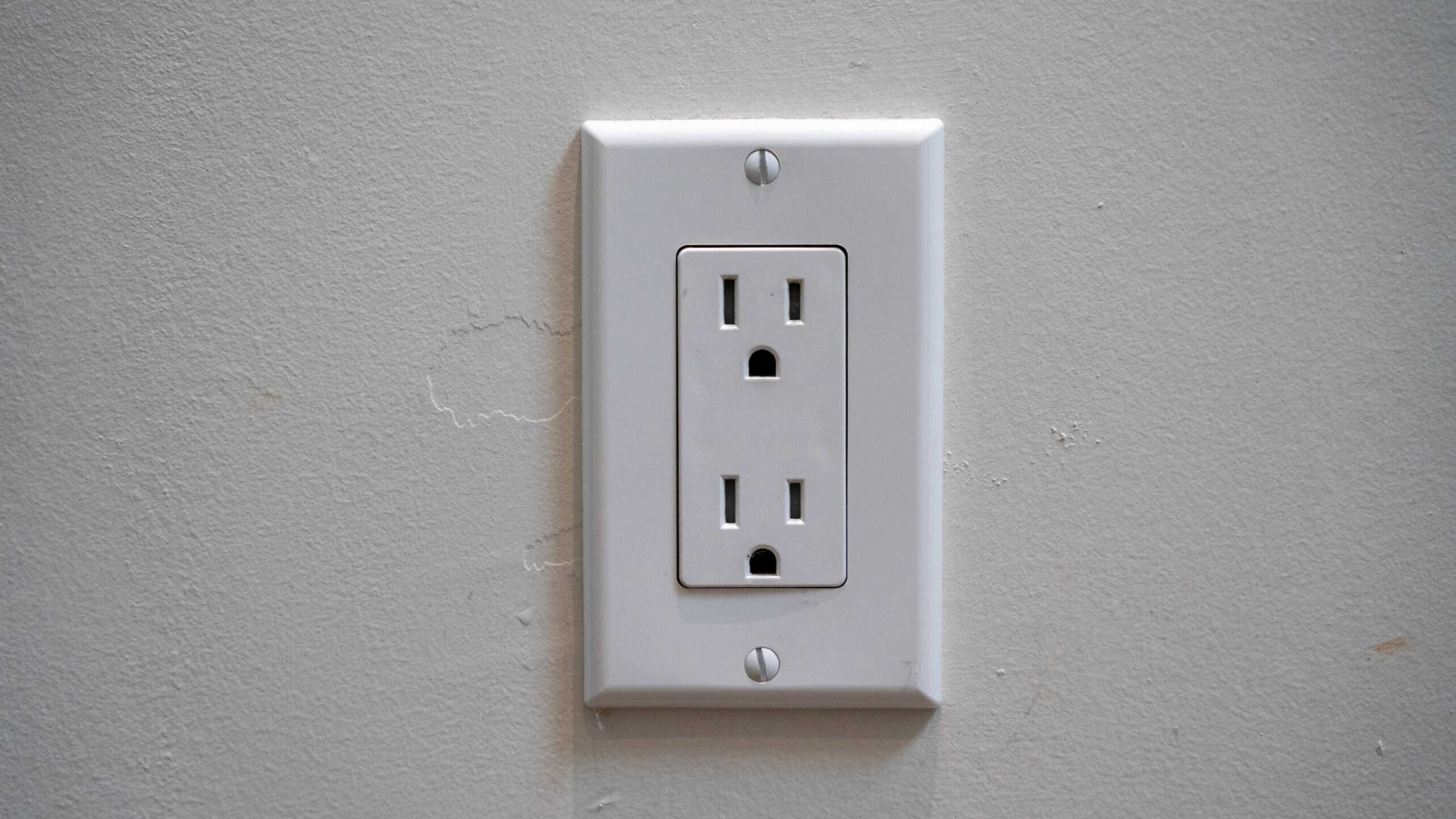 Wall outlet with an America-Canada style plug socket.