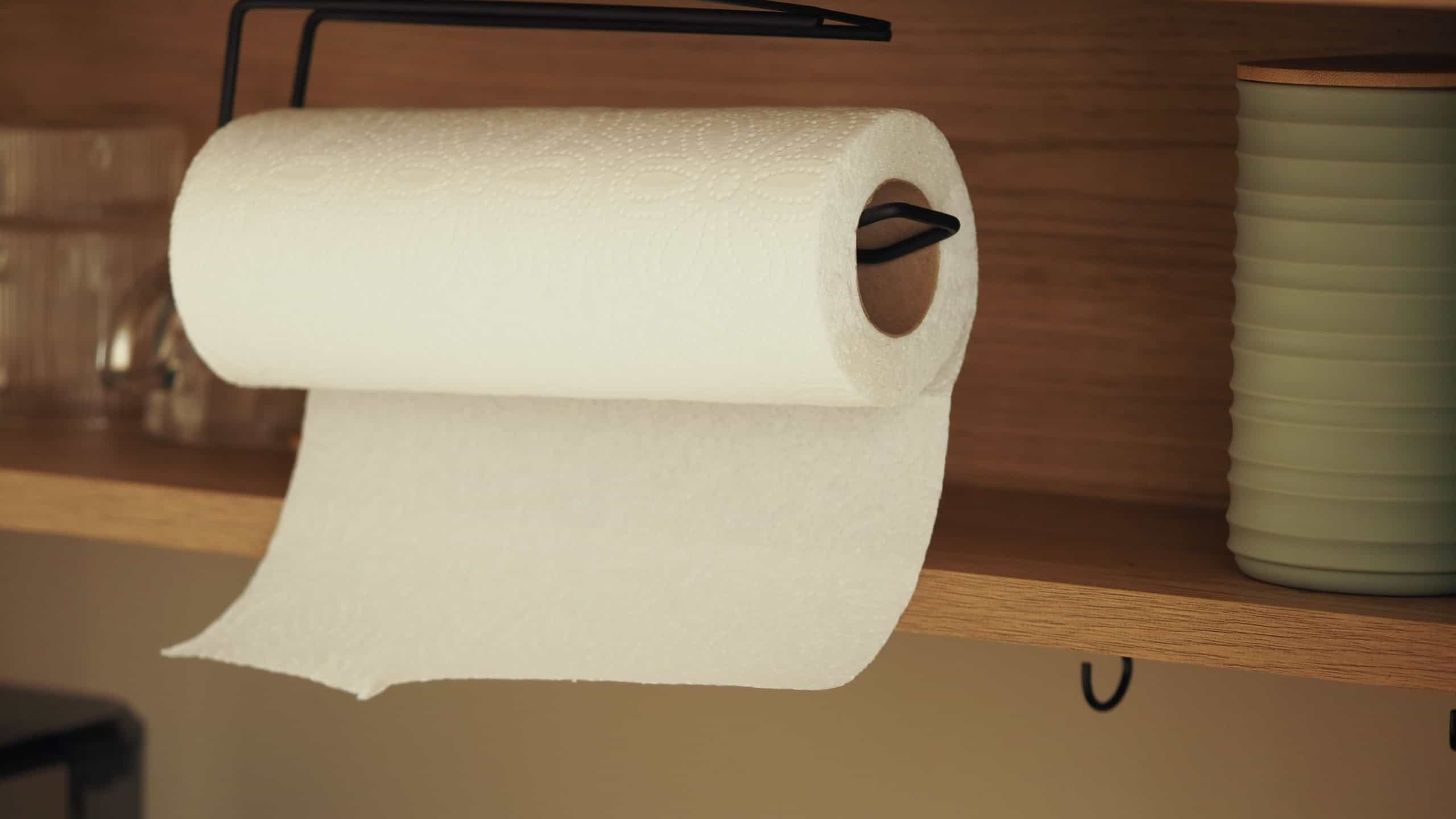 Kitchen paper towel holder with fresh roll in modern design