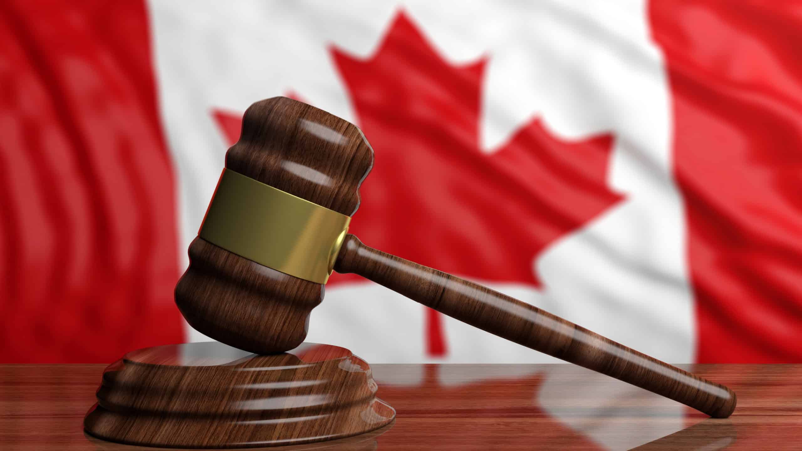 Auction gavel on Canada flag background. 3d illustration