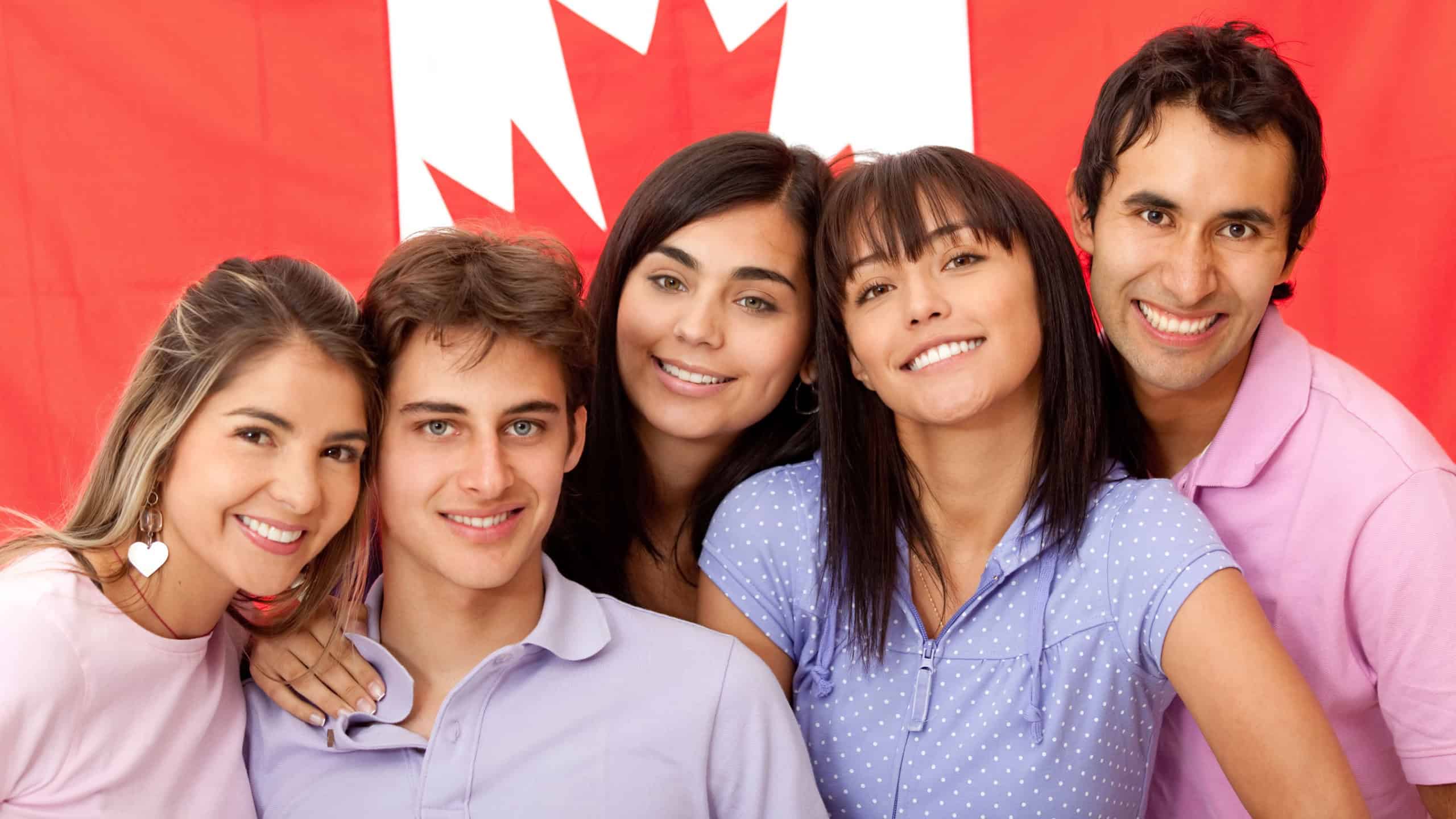 Group of English or French students with the flag of Canada