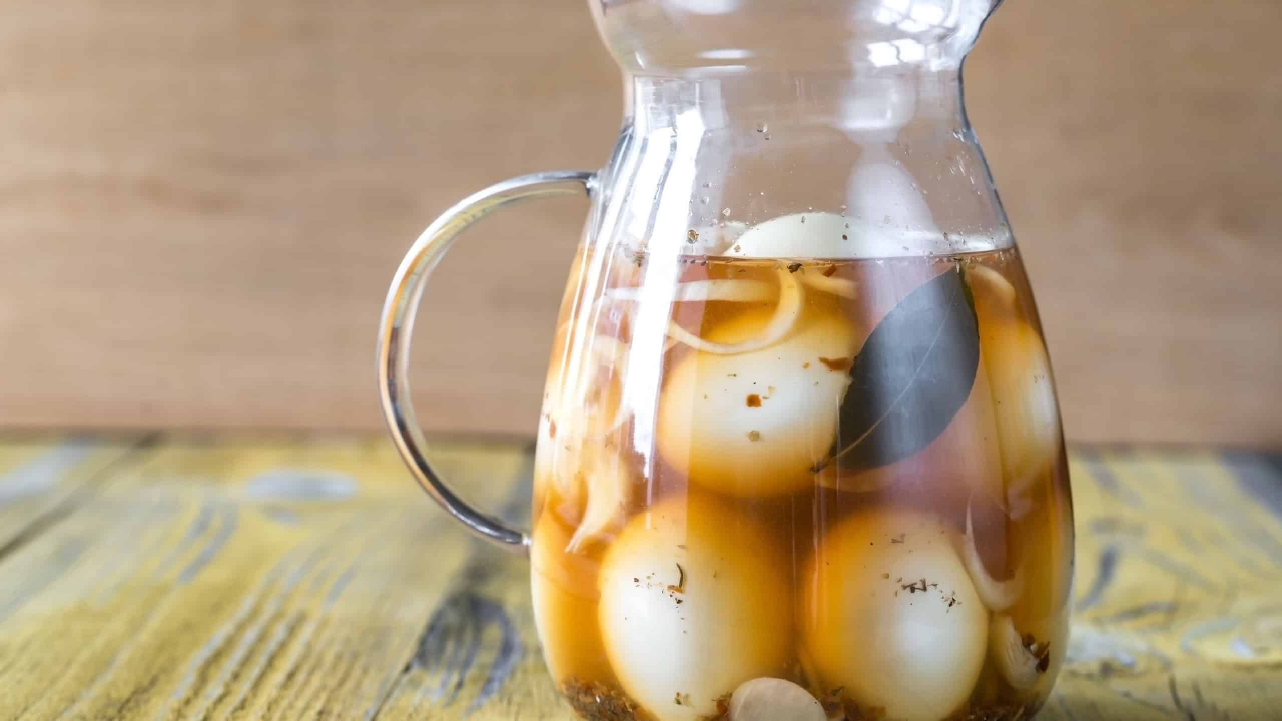 Pickled eggs in the glass jug