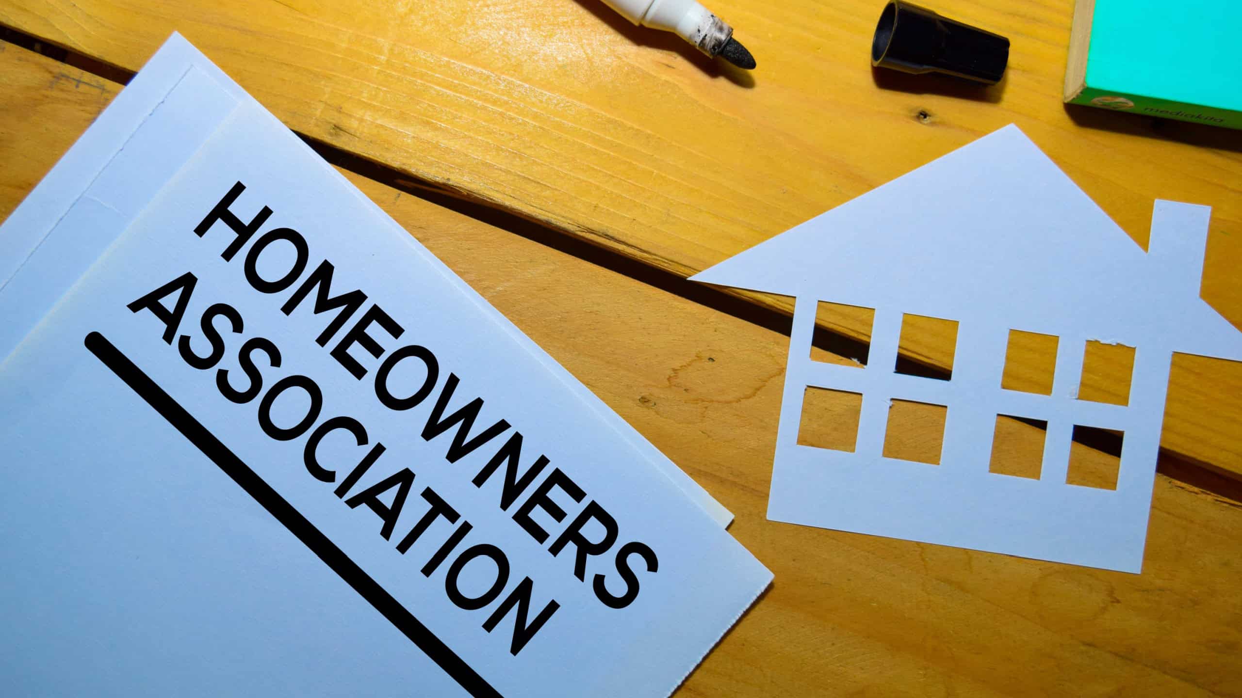 Homeowners Association text on Document isolated on office desk.