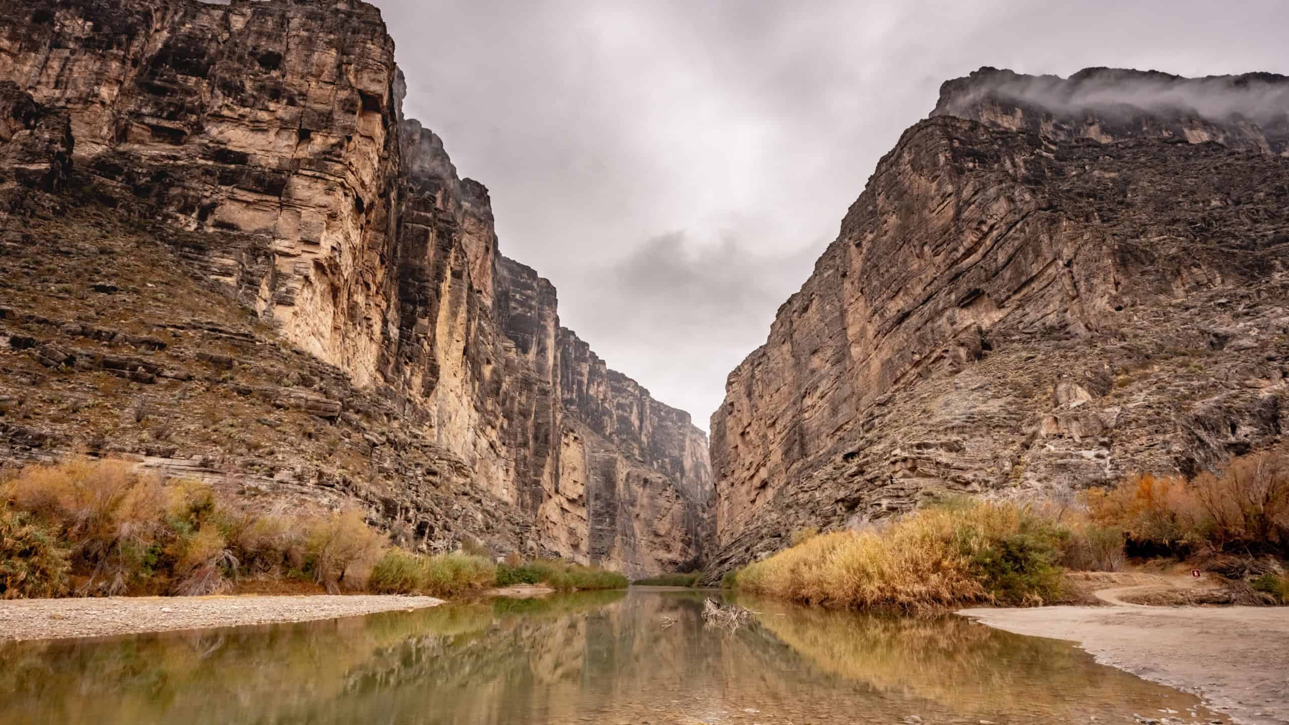 Calm Waters of the Rio Grande River Through Santa Elena Canyon on a foggy afternoon