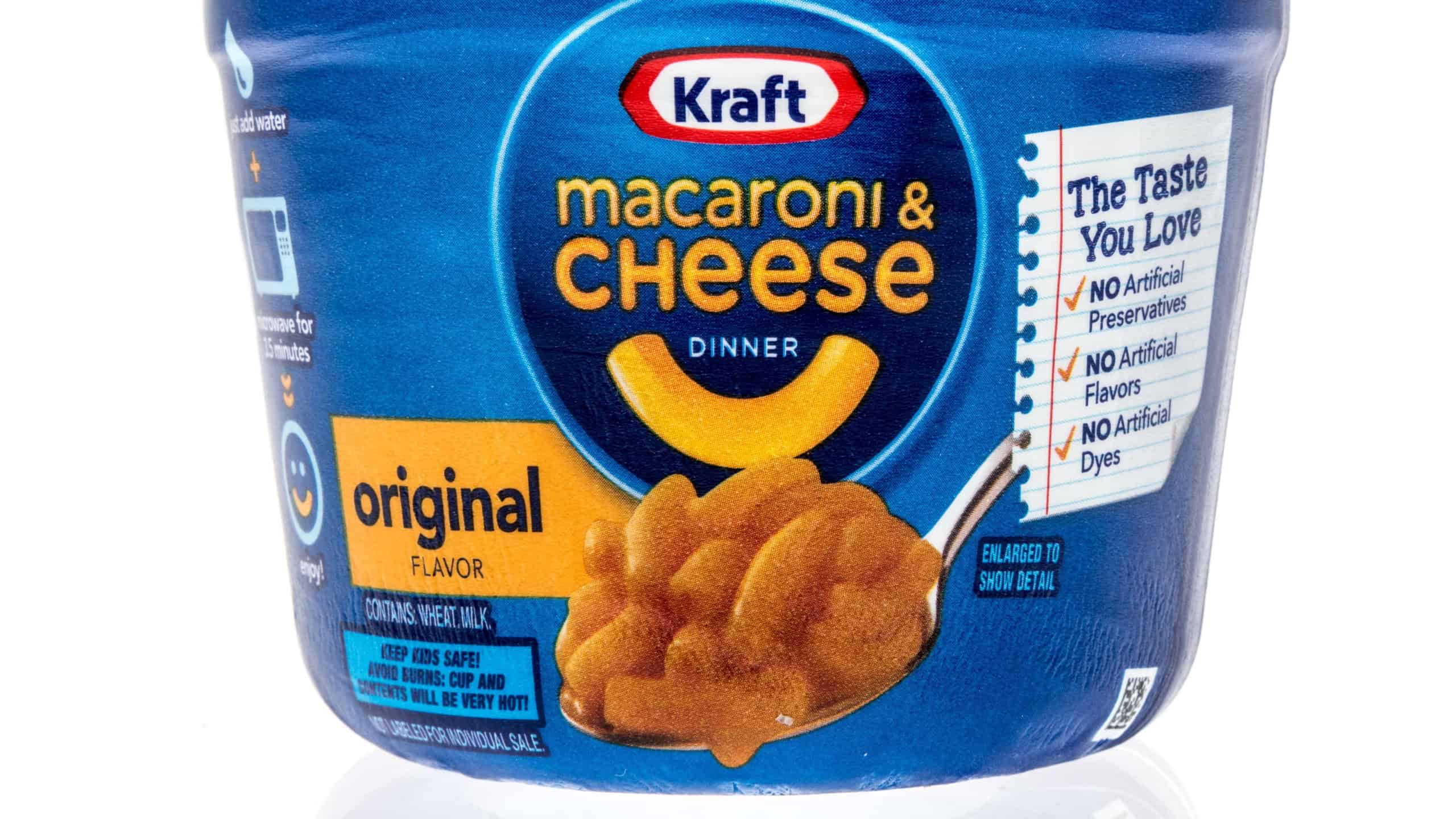 A package of Kraft macaroni and cheese dinner on an isolated background