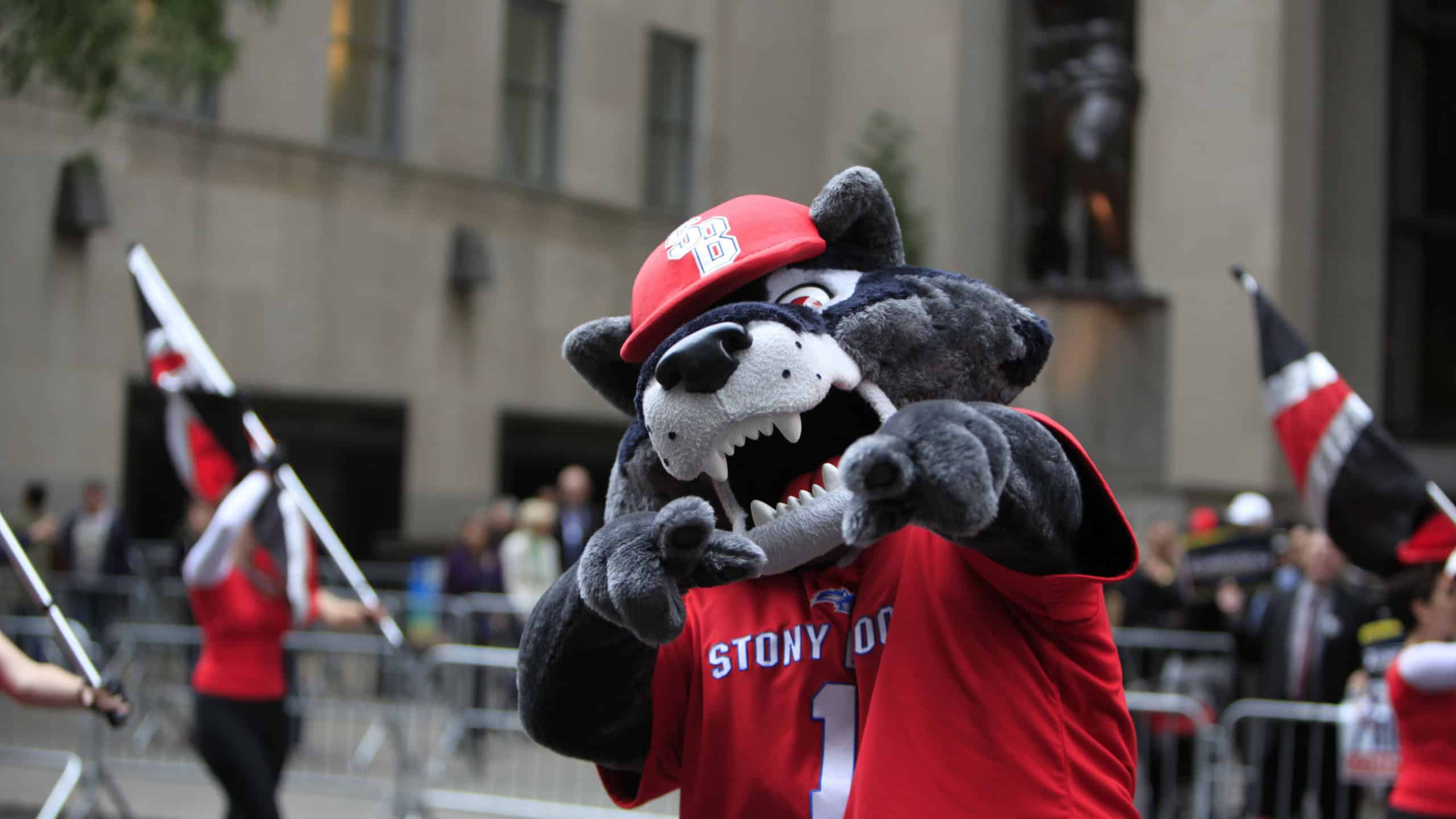 NEW YORK CITY - OCTOBER 13 2014: the 70th annual Columbus Day parade filled Fifth Avenue with thousands of marchers celebrating the pride of Italian heritage. High school mascot