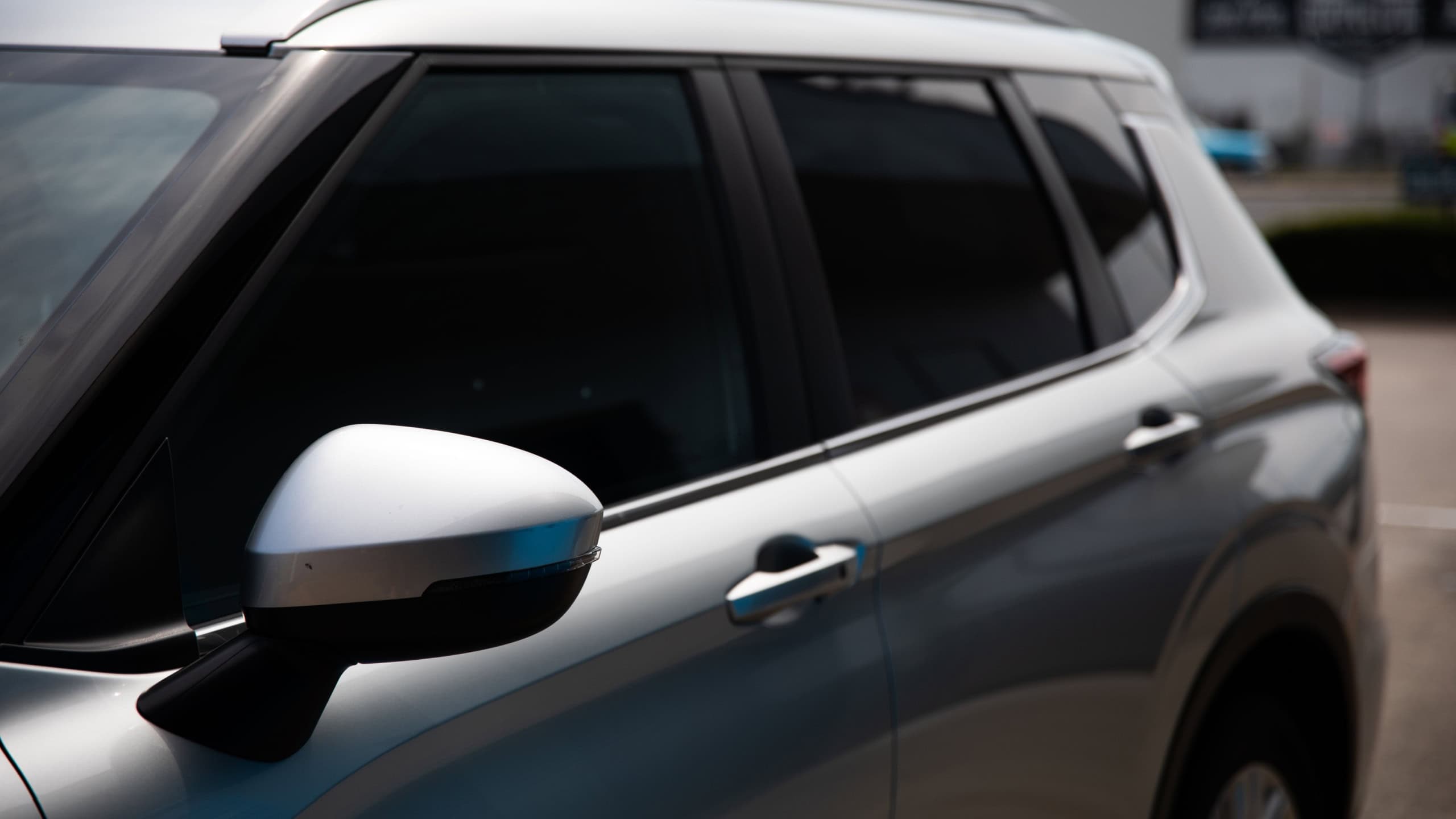 Silver car wagon suv parked petrol station tinted windows