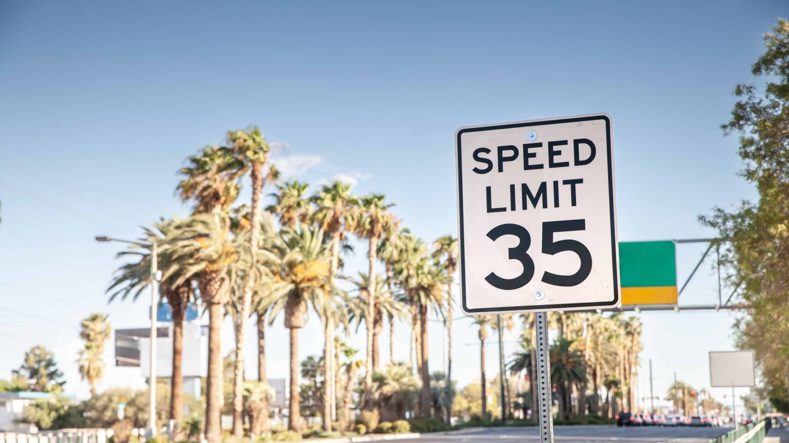American speed limit sign displaying 35 mph, compliant with MUTCD guidelines, situated alongside a Nevada roadway indicating cars and vehicles can't go over 35 miles per hour.