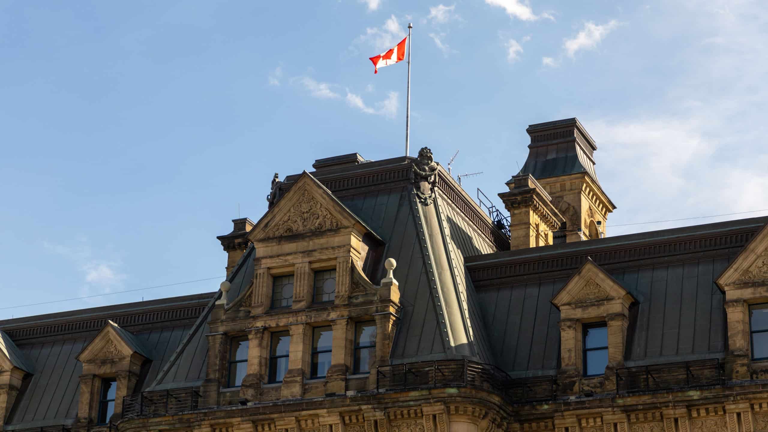 Prime Minister's Office building with Canadian flag in Ottawa, Canada