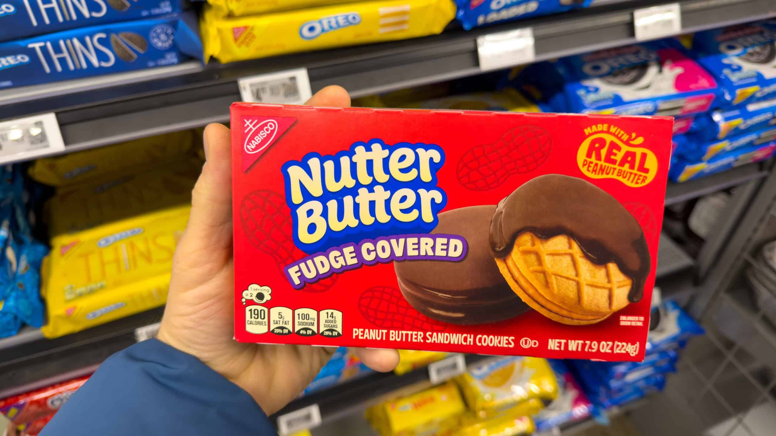 IRVINE, CALIFORNIA - 23 SEPT 2021: A large pile of 100 Grand Fun Size Candy Bars for Halloween.