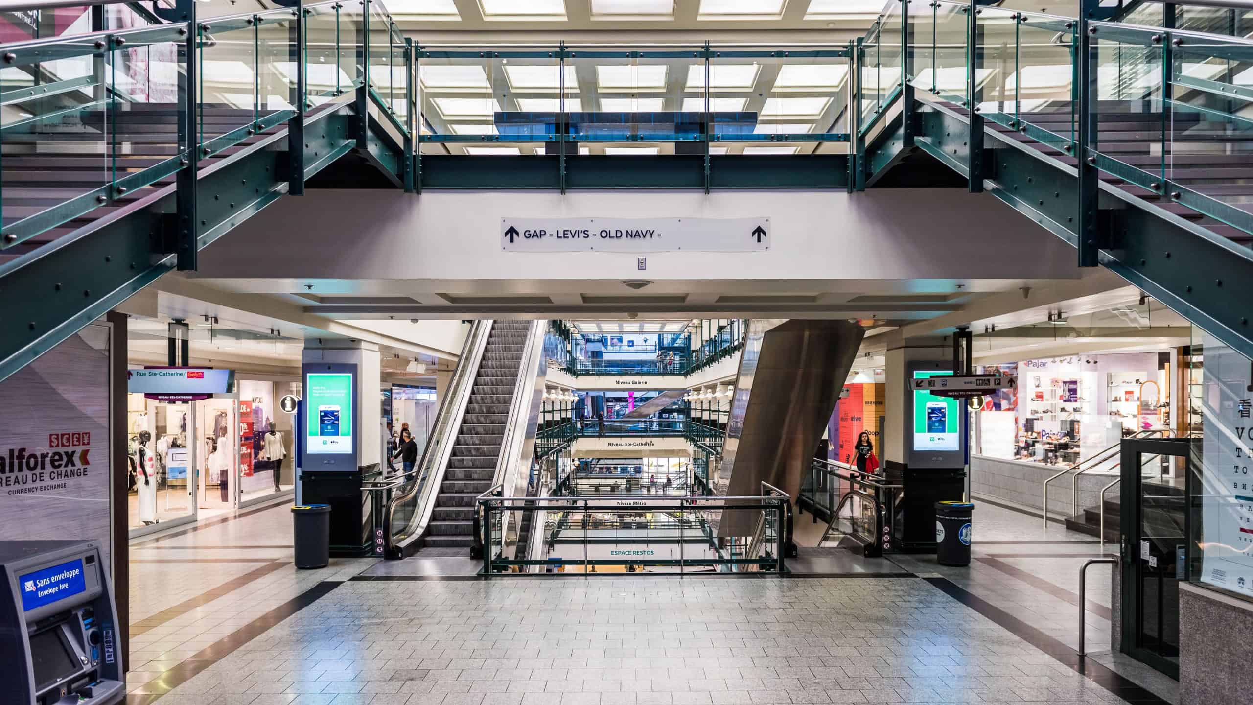 Montreal, Canada - May 26, 2017: Underground city shopping mall with GAP store in downtown area in Quebec region