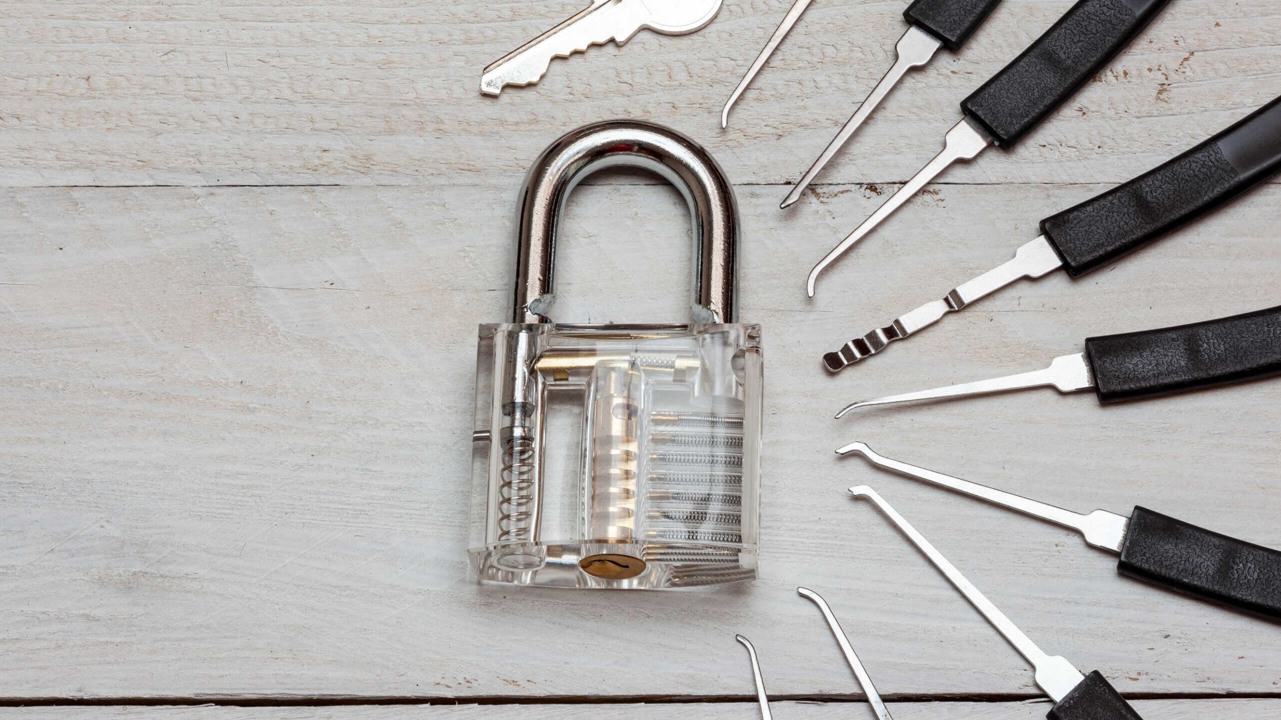 Several lockpicking devices to open a lock on a door