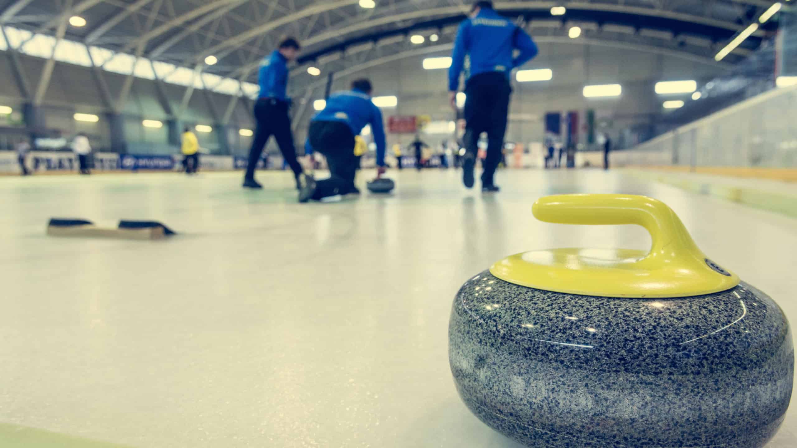 Curling stone on a game sheet.