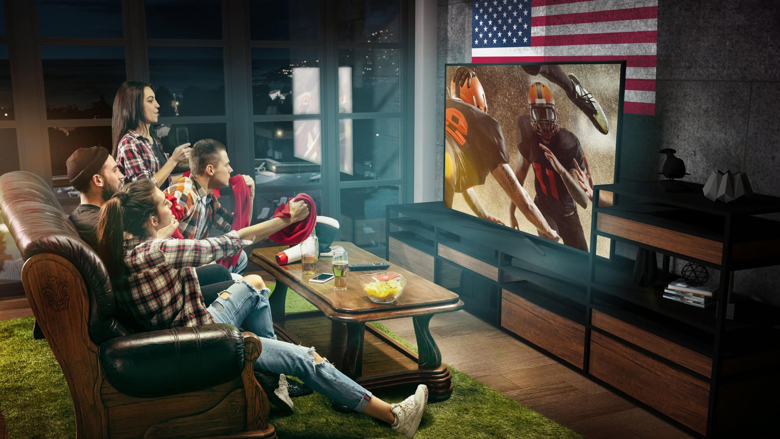 Group of friends watching TV, american football match, championship. Emotional men and women cheering for favourite team, look on fighting for ball. Concept of friendship, sport, competition, emotions