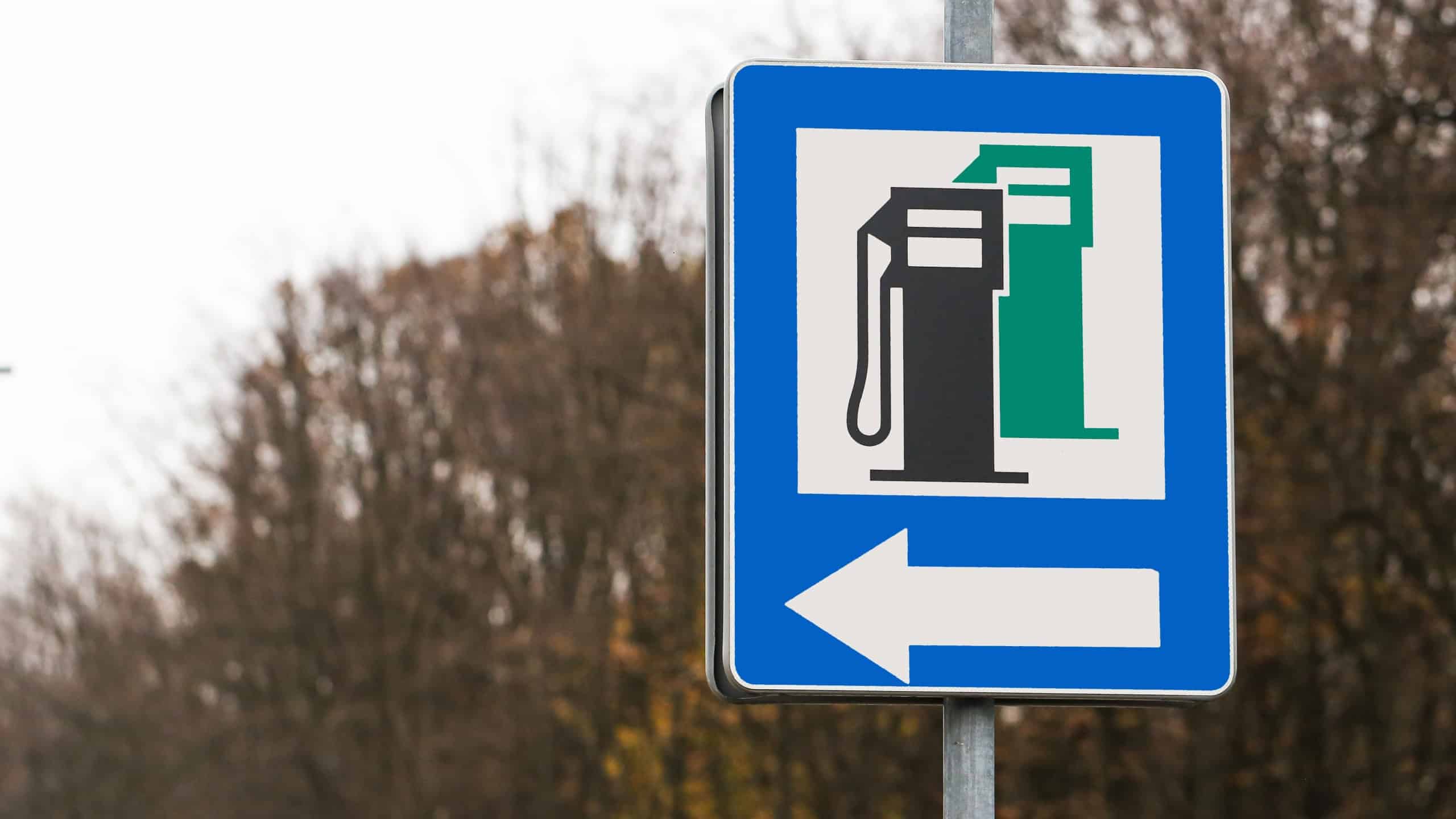 Gas station sign representing rising fuel prices and high transportation costs