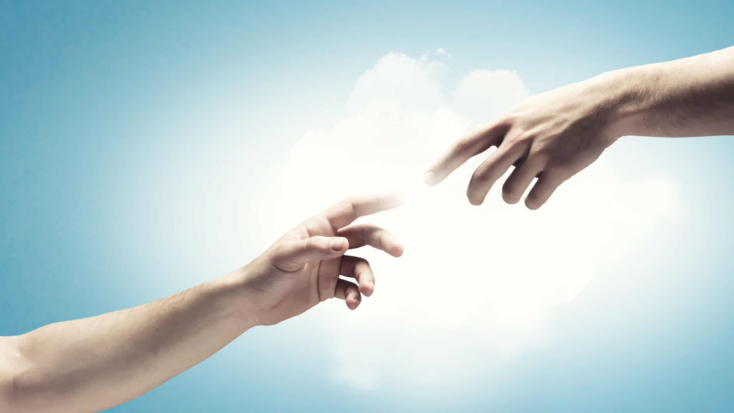 Close up of human hands touching with fingers