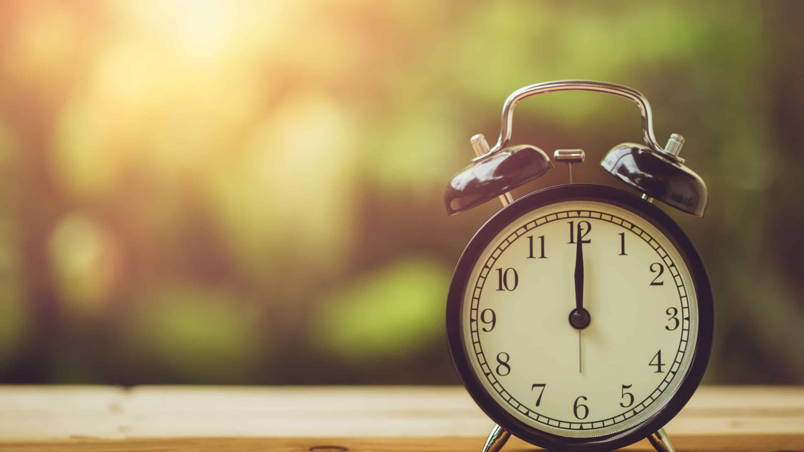 12 o'clock retro clock vintage color tone in the garden