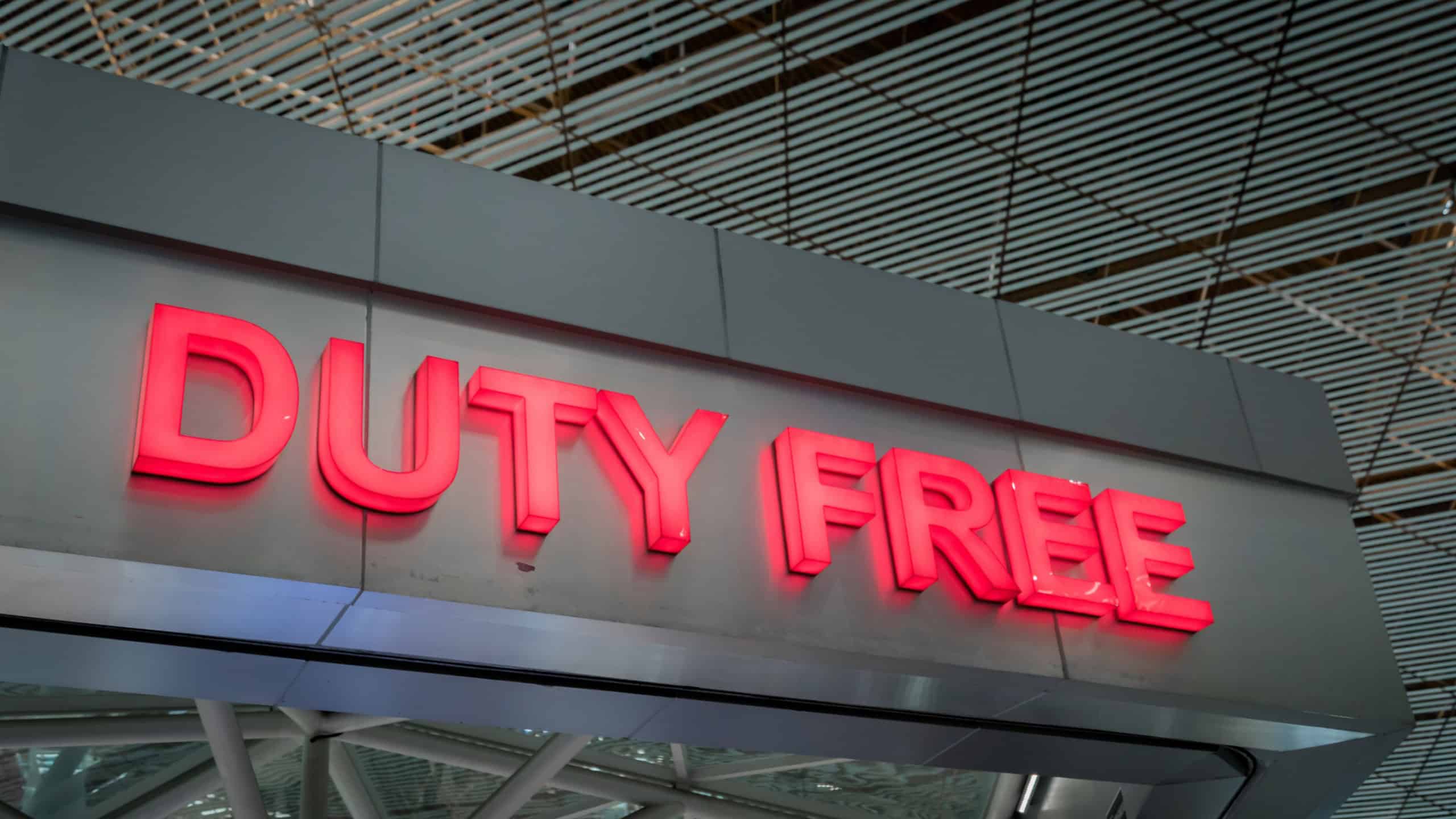 duty free shop sign inside of an international airport