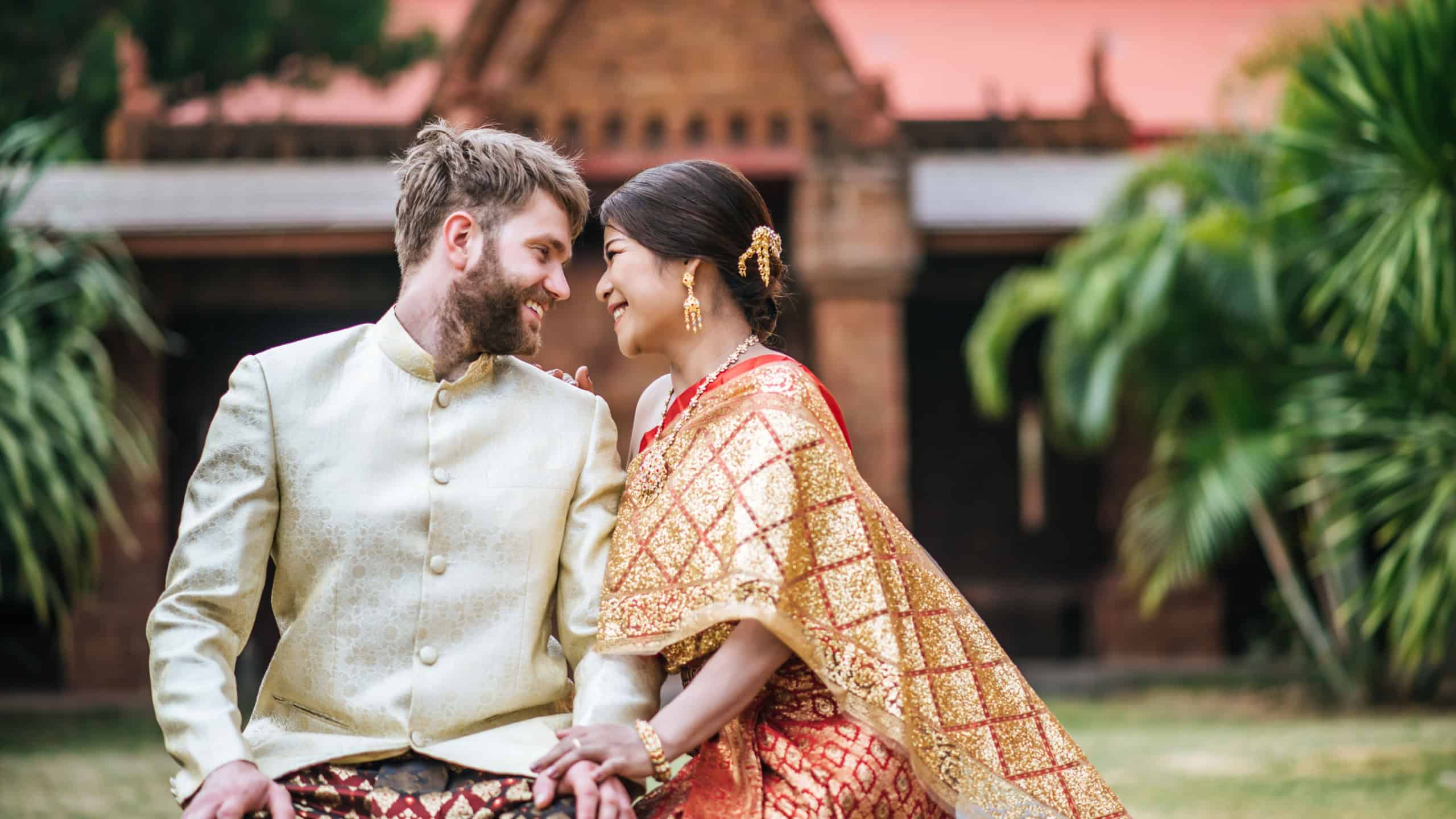 Asian bride and Caucasian groom have romantic time with Thailand dress