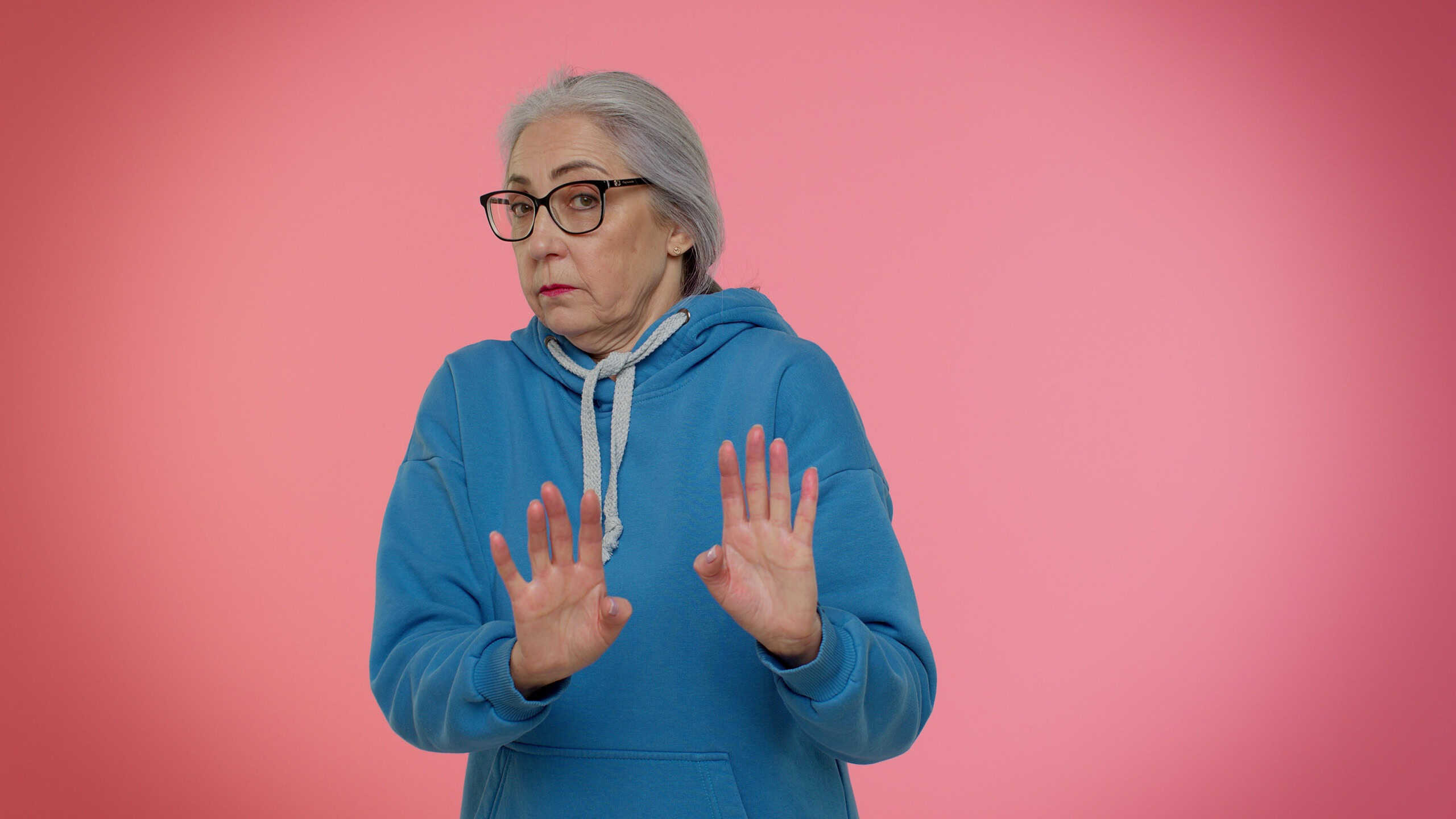 I dont know what to say. Confused mature old good-looking granny grandmother feeling embarrassed about ambiguous question, having doubts no idea, being clueless and uncertain. Senior woman studio shot