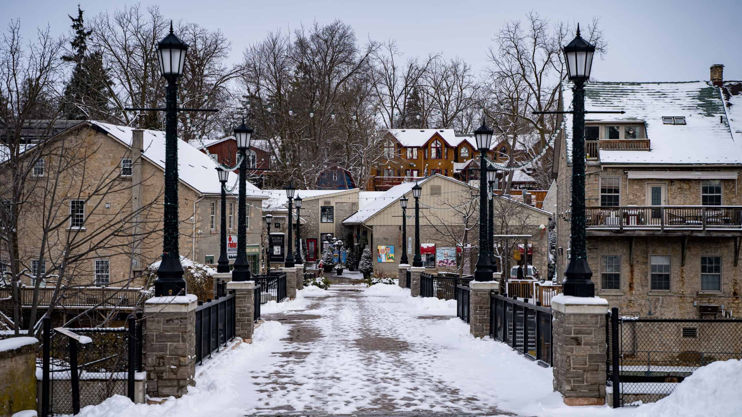 Winter view of the bridge in Elora town, Ontario. Elora, Canada - January 2, 2025.