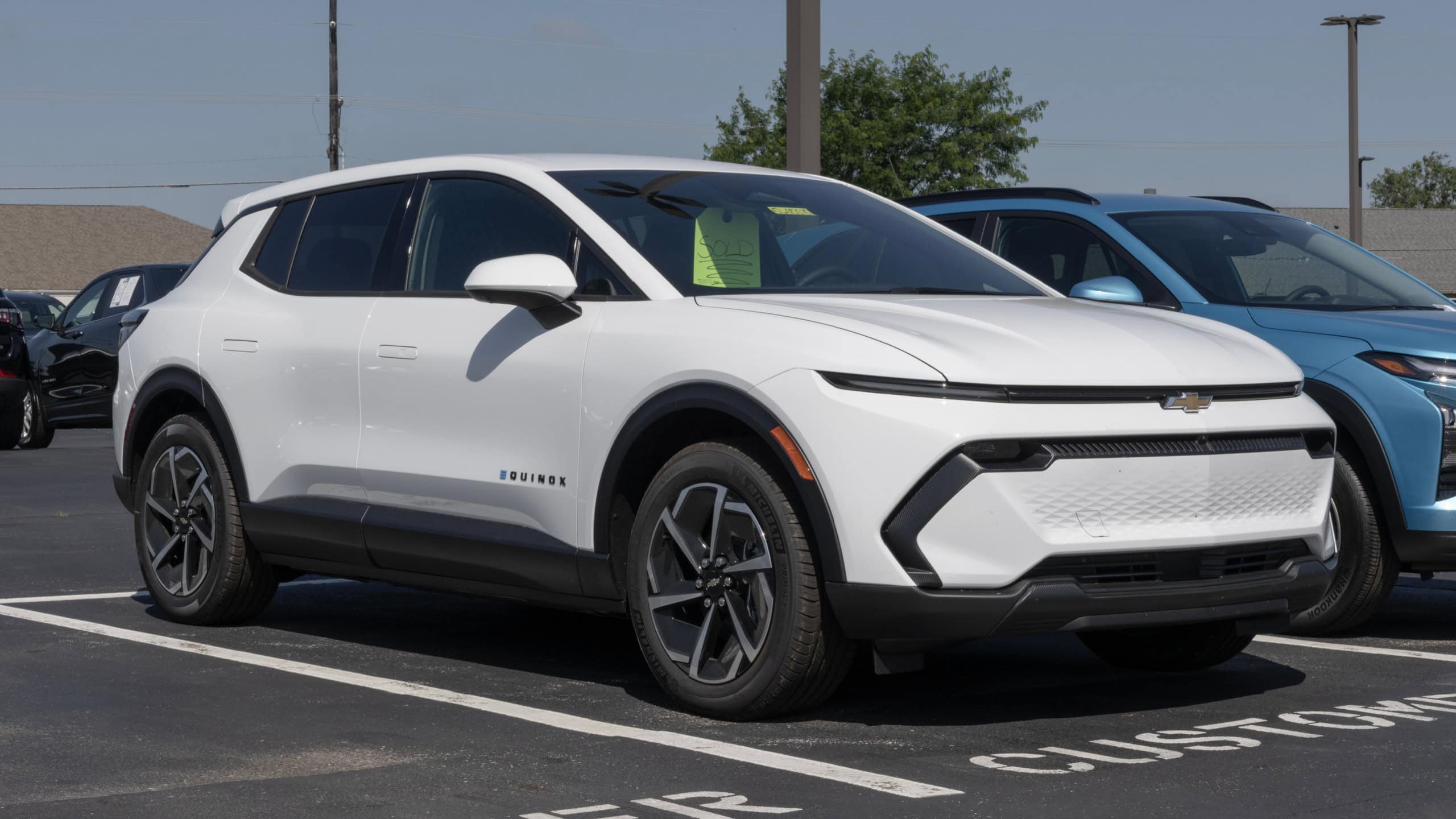 Avon - June 22, 2025: Chevrolet Equinox EV LT Electric SUV display. Chevy offers the Equinox EV with up to 319 miles of driving range. MY:2025