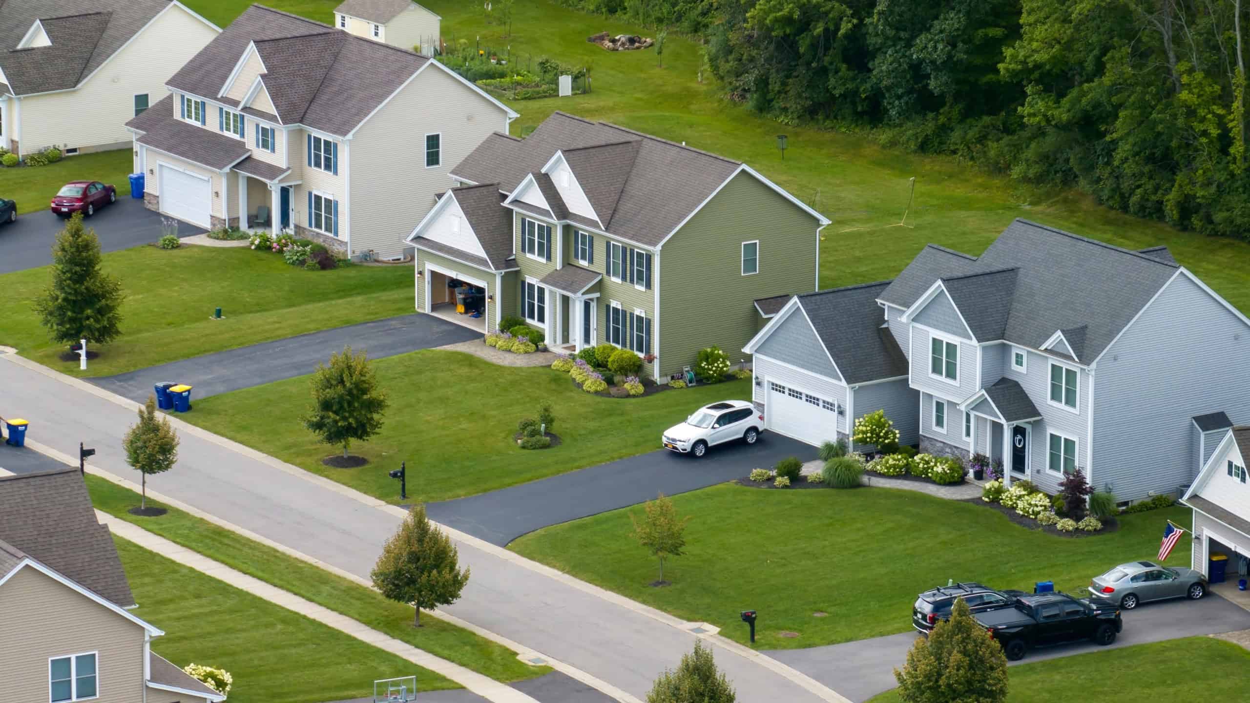 Top view of expensive two story private houses in Rochester NY suburbia. New family homes in upscale community. Real estate development in american suburbs