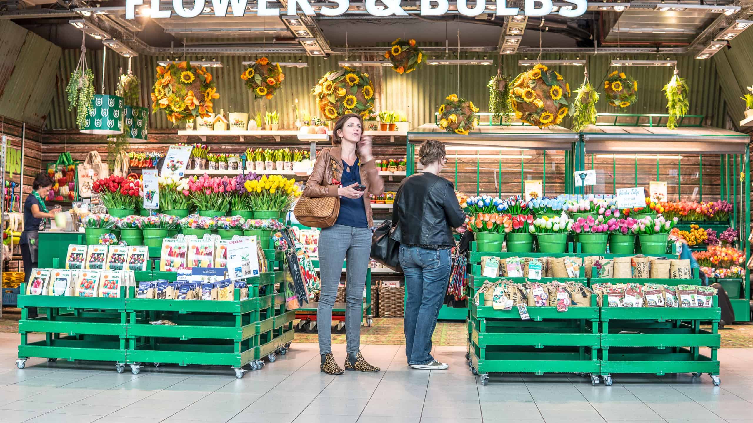 Flowers, Bulbs, seeds, Gifts, store with Everlasting Tulips, customers looking for souvenir