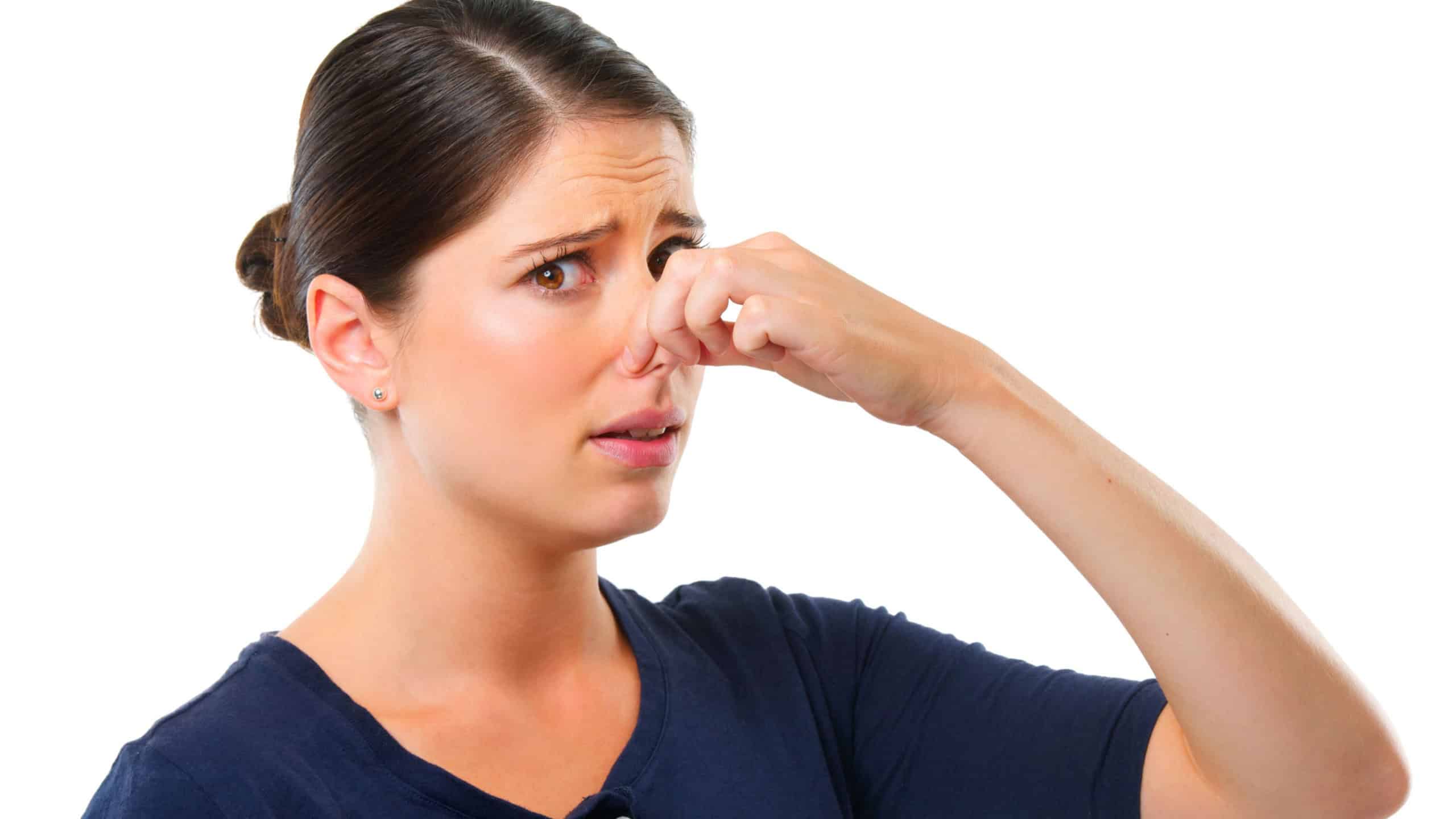 Gross. Smell, yuck and portrait for woman with disgust facial expression 