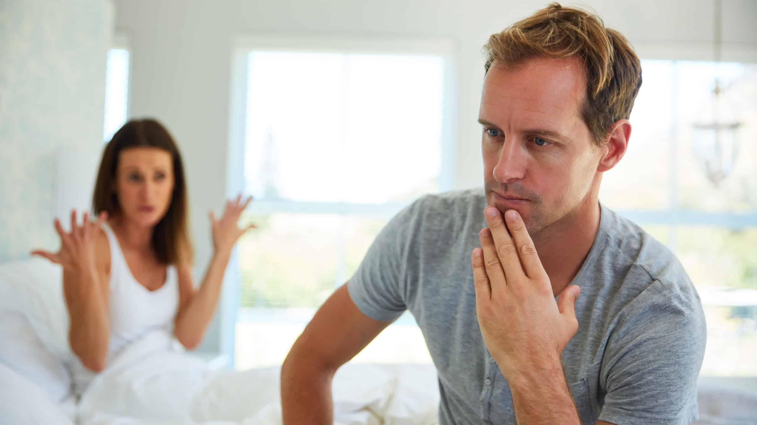 Thinking, married and man in bedroom at house with stress, anxiety and problem of secret conflict from woman.